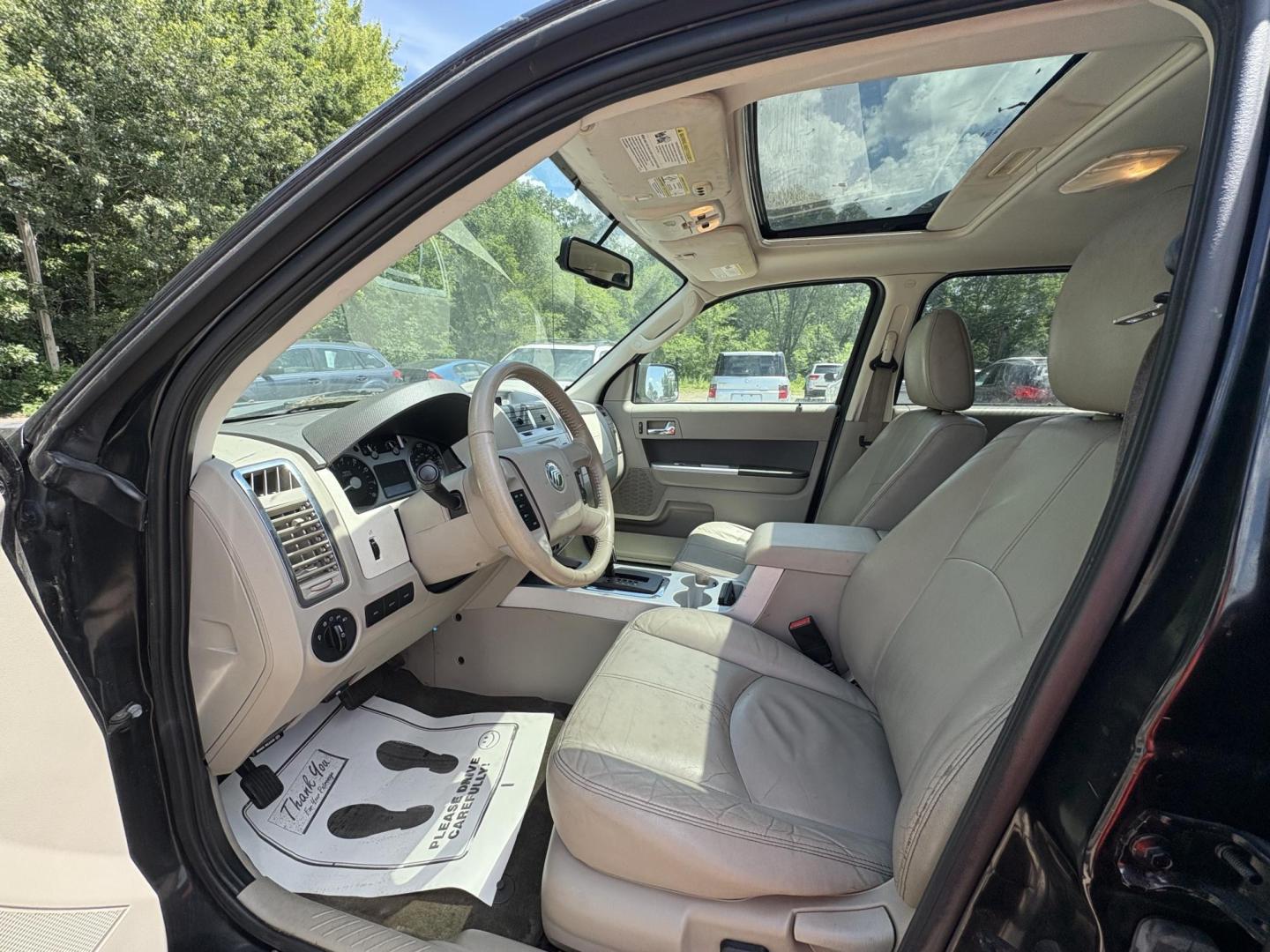 2011 Mercury Mariner Premier V6 2WD (4M2CN8HG6BK) , 6-Speed Automatic transmission, located at 17255 hwy 65 NE, Ham Lake, MN, 55304, 0.000000, 0.000000 - Photo#9