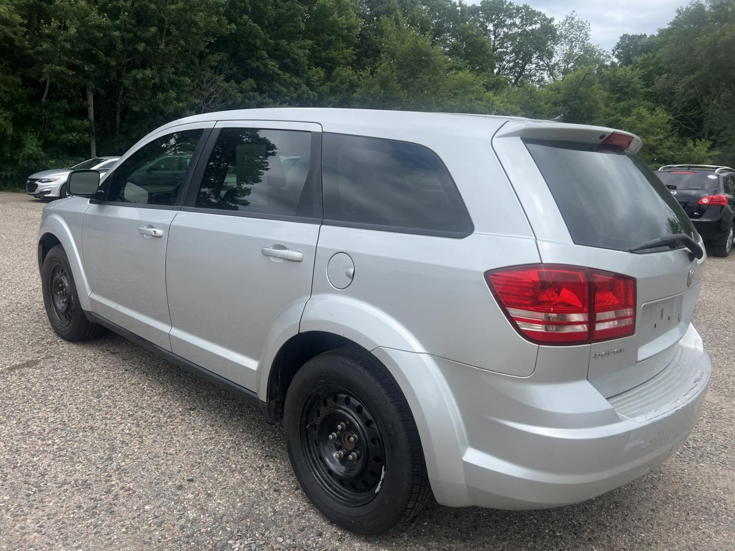 2009 Dodge Journey SE (3D4GG47B69T) with an 2.4L L4 DOHC 16V engine, 4-Speed Automatic Overdrive transmission, located at 17255 hwy 65 NE, Ham Lake, MN, 55304, 0.000000, 0.000000 - Photo#2