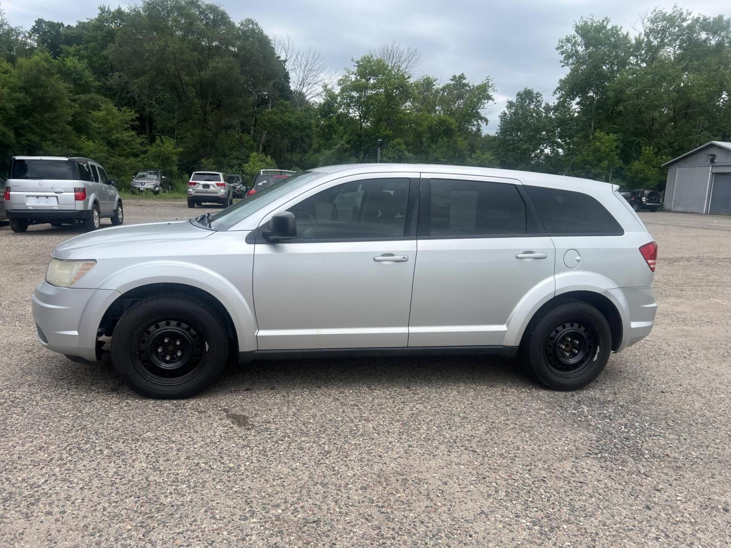 2009 Dodge Journey SE (3D4GG47B69T) with an 2.4L L4 DOHC 16V engine, 4-Speed Automatic Overdrive transmission, located at 17255 hwy 65 NE, Ham Lake, MN, 55304, 0.000000, 0.000000 - Photo#1