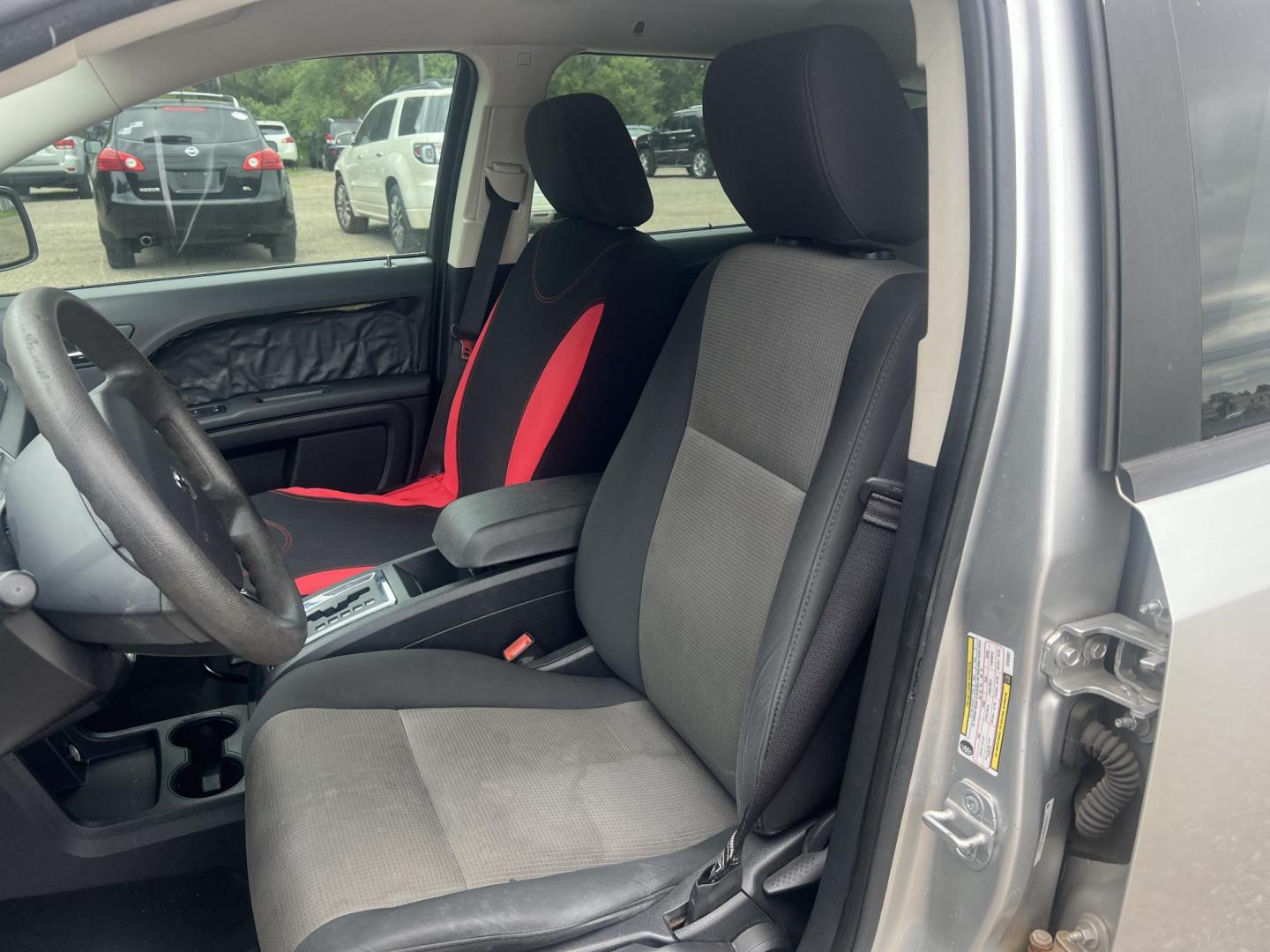 2009 Dodge Journey SE (3D4GG47B69T) with an 2.4L L4 DOHC 16V engine, 4-Speed Automatic Overdrive transmission, located at 17255 hwy 65 NE, Ham Lake, MN, 55304, 0.000000, 0.000000 - Photo#9