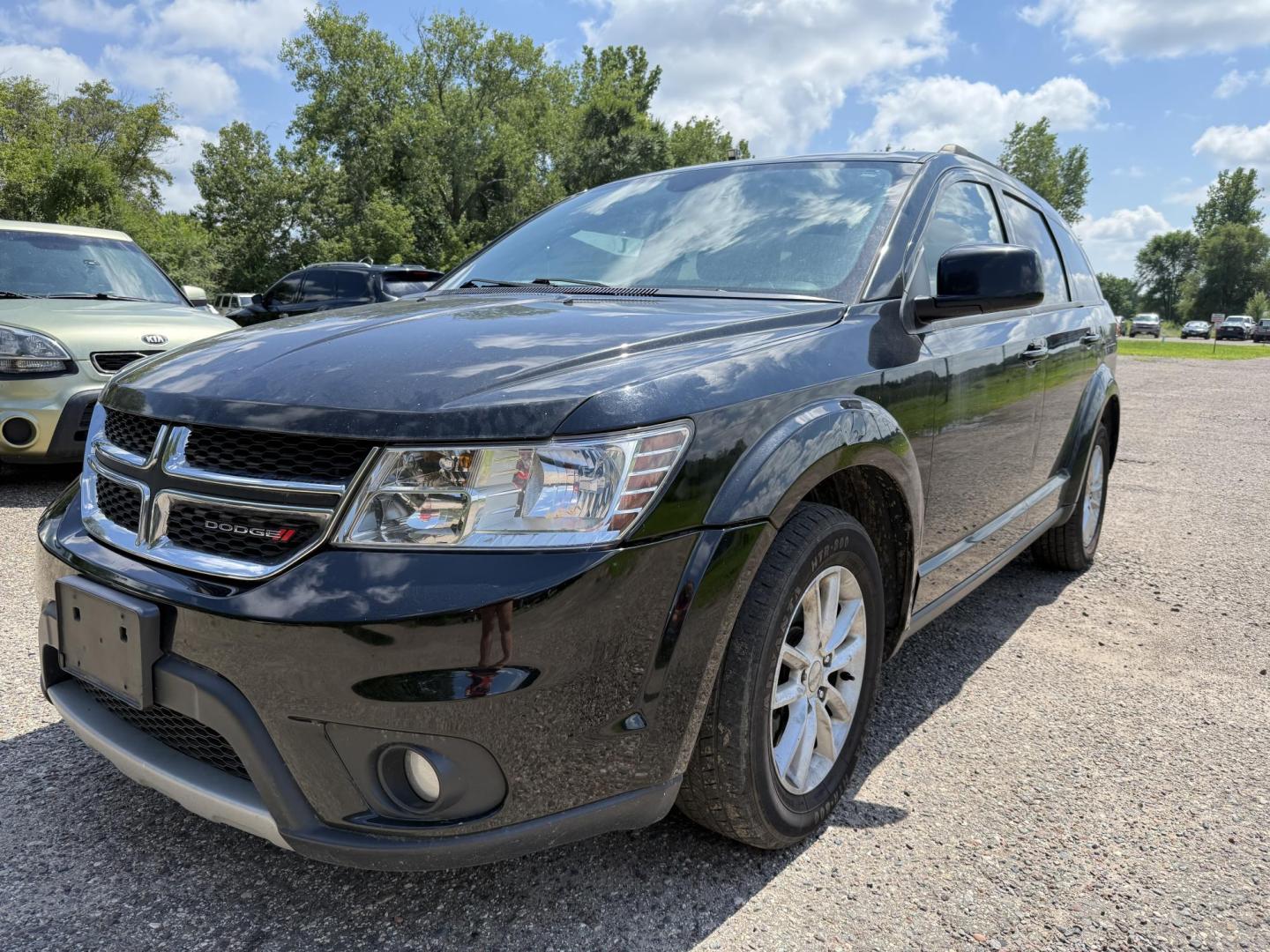 2014 Dodge Journey SXT (3C4PDCBG7ET) with an 3.6L V6 DOHC 24V engine, 6-Speed Automatic transmission, located at 17255 hwy 65 NE, Ham Lake, MN, 55304, 0.000000, 0.000000 - Photo#0