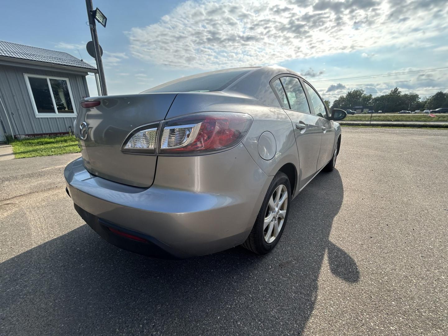 2011 Mazda MAZDA3 i Touring 4-Door (JM1BL1VF6B1) with an 2.0L L4 DOHC 16V engine, located at 17255 hwy 65 NE, Ham Lake, MN, 55304, 0.000000, 0.000000- Photo#3