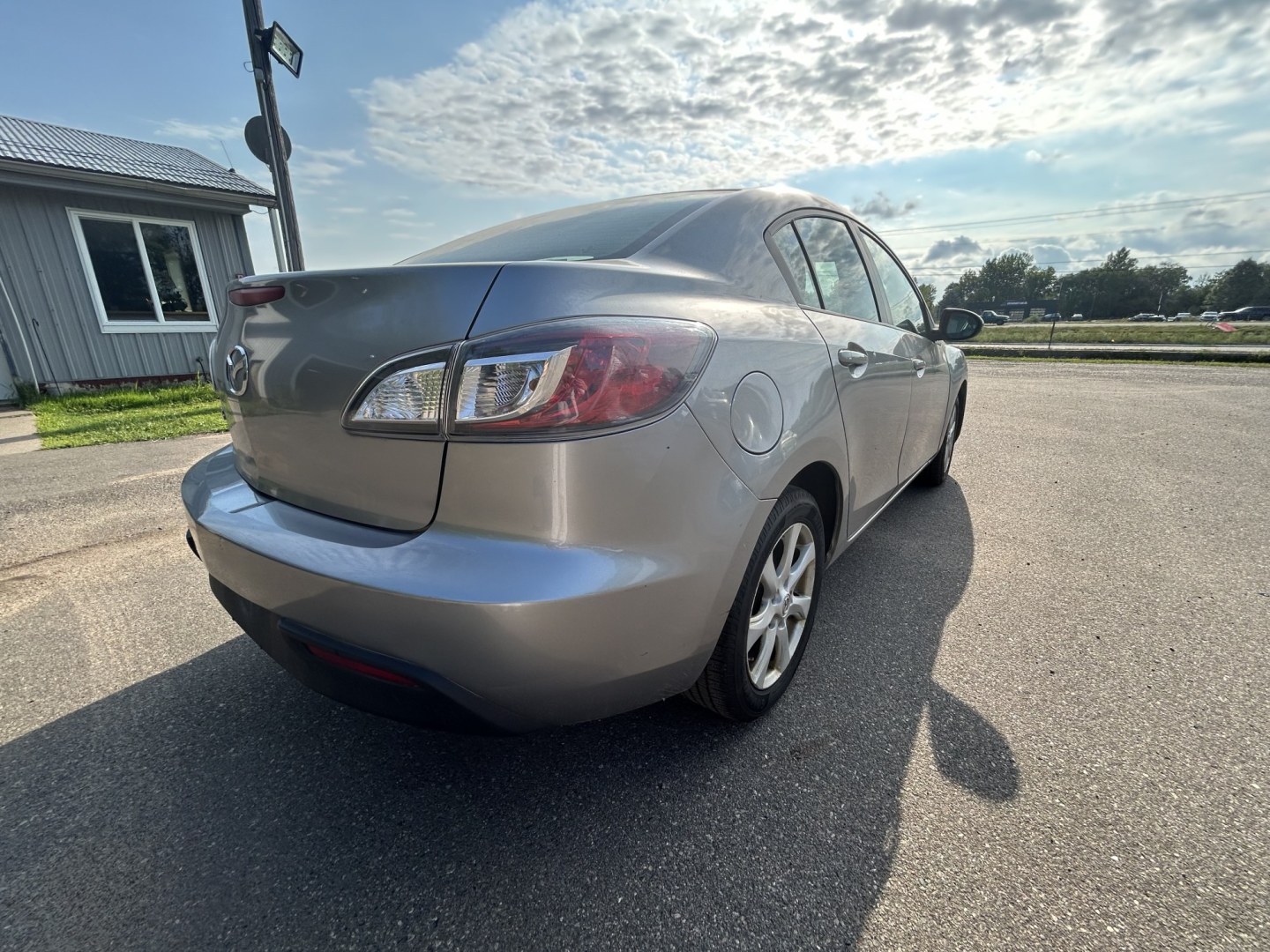 2011 Mazda MAZDA3 i Touring 4-Door (JM1BL1VF6B1) with an 2.0L L4 DOHC 16V engine, located at 17255 hwy 65 NE, Ham Lake, MN, 55304, 0.000000, 0.000000- Photo#3