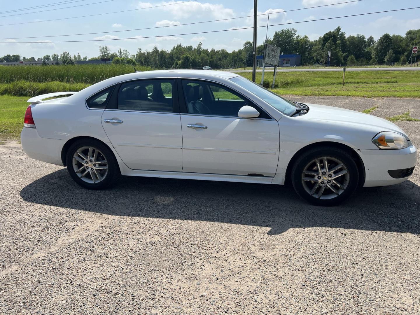 2011 Chevrolet Impala LTZ (2G1WC5EM1B1) with an 3.9L V6 OHV 16V FFV engine, 4-Speed Automatic transmission, located at 17255 hwy 65 NE, Ham Lake, MN, 55304, 0.000000, 0.000000 - Photo#3