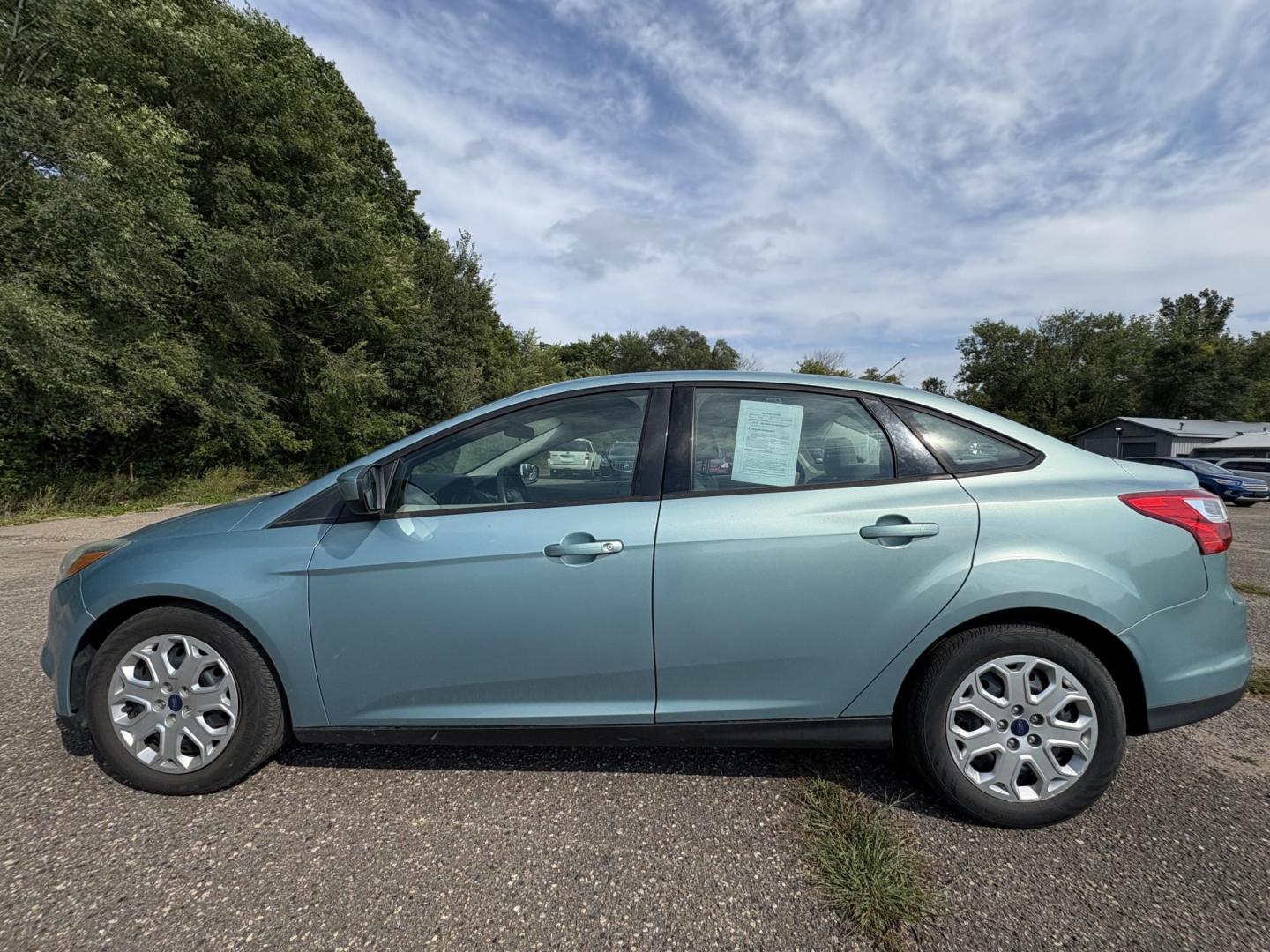 2012 Ford Focus SE Sedan (1FAHP3F2XCL) with an 2.0L L4 DOHC 16V engine, located at 17255 hwy 65 NE, Ham Lake, MN, 55304, 0.000000, 0.000000 - Photo#1
