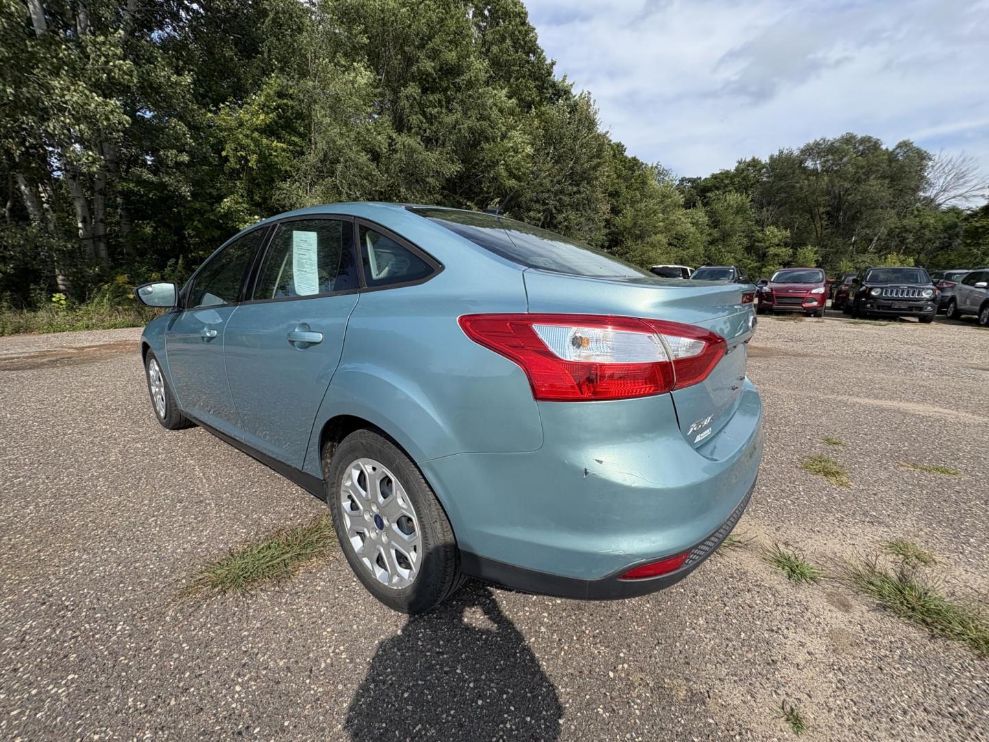 2012 Ford Focus SE Sedan (1FAHP3F2XCL) with an 2.0L L4 DOHC 16V engine, located at 17255 hwy 65 NE, Ham Lake, MN, 55304, 0.000000, 0.000000 - Photo#2