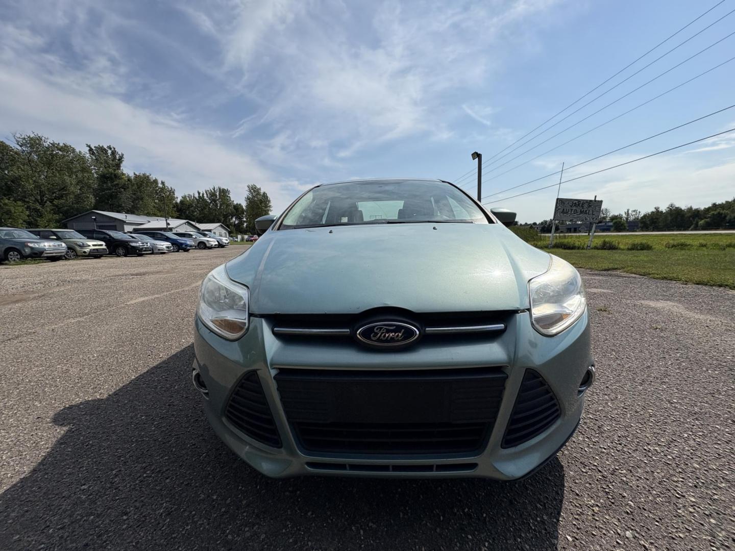 2012 Ford Focus SE Sedan (1FAHP3F2XCL) with an 2.0L L4 DOHC 16V engine, located at 17255 hwy 65 NE, Ham Lake, MN, 55304, 0.000000, 0.000000 - Photo#7