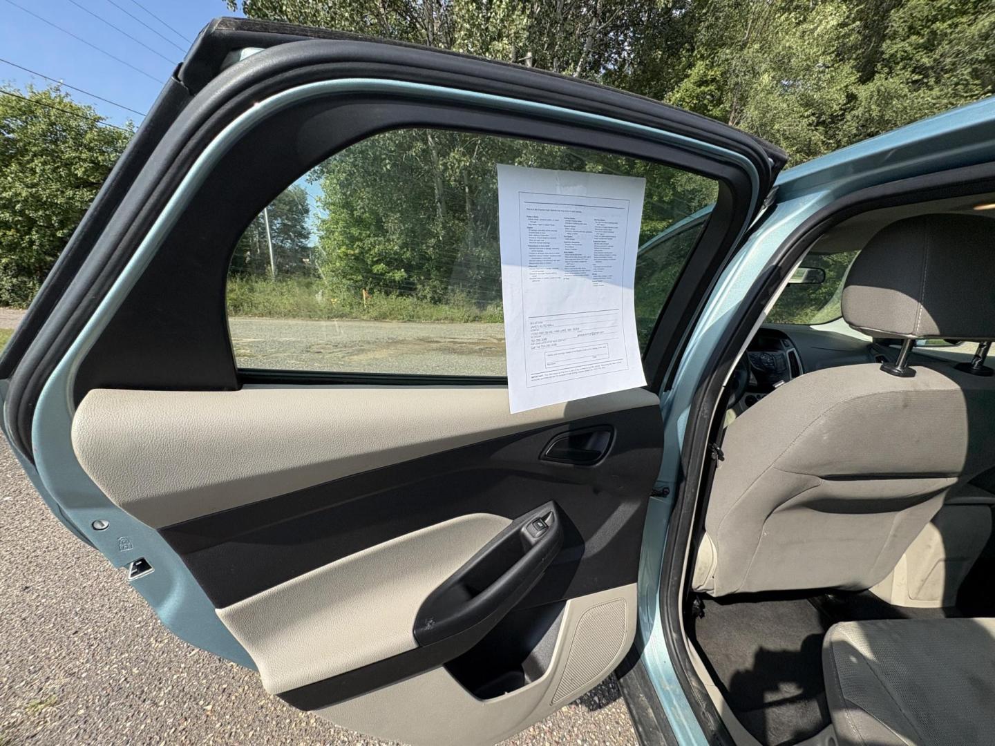2012 Ford Focus SE Sedan (1FAHP3F2XCL) with an 2.0L L4 DOHC 16V engine, located at 17255 hwy 65 NE, Ham Lake, MN, 55304, 0.000000, 0.000000 - Photo#10