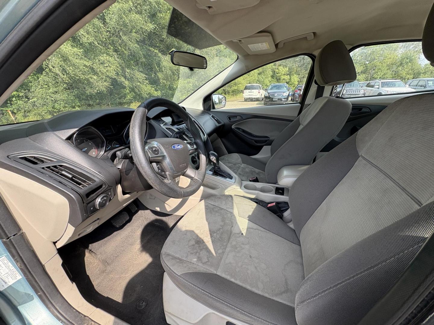 2012 Ford Focus SE Sedan (1FAHP3F2XCL) with an 2.0L L4 DOHC 16V engine, located at 17255 hwy 65 NE, Ham Lake, MN, 55304, 0.000000, 0.000000 - Photo#9