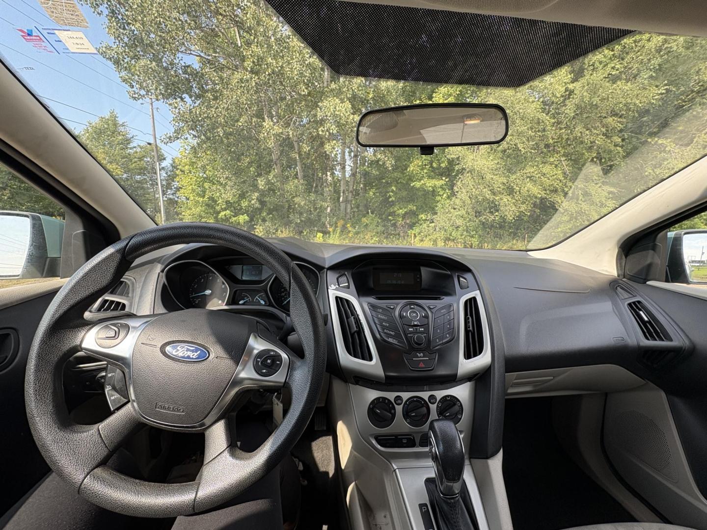 2012 Ford Focus SE Sedan (1FAHP3F2XCL) with an 2.0L L4 DOHC 16V engine, located at 17255 hwy 65 NE, Ham Lake, MN, 55304, 0.000000, 0.000000 - Photo#16