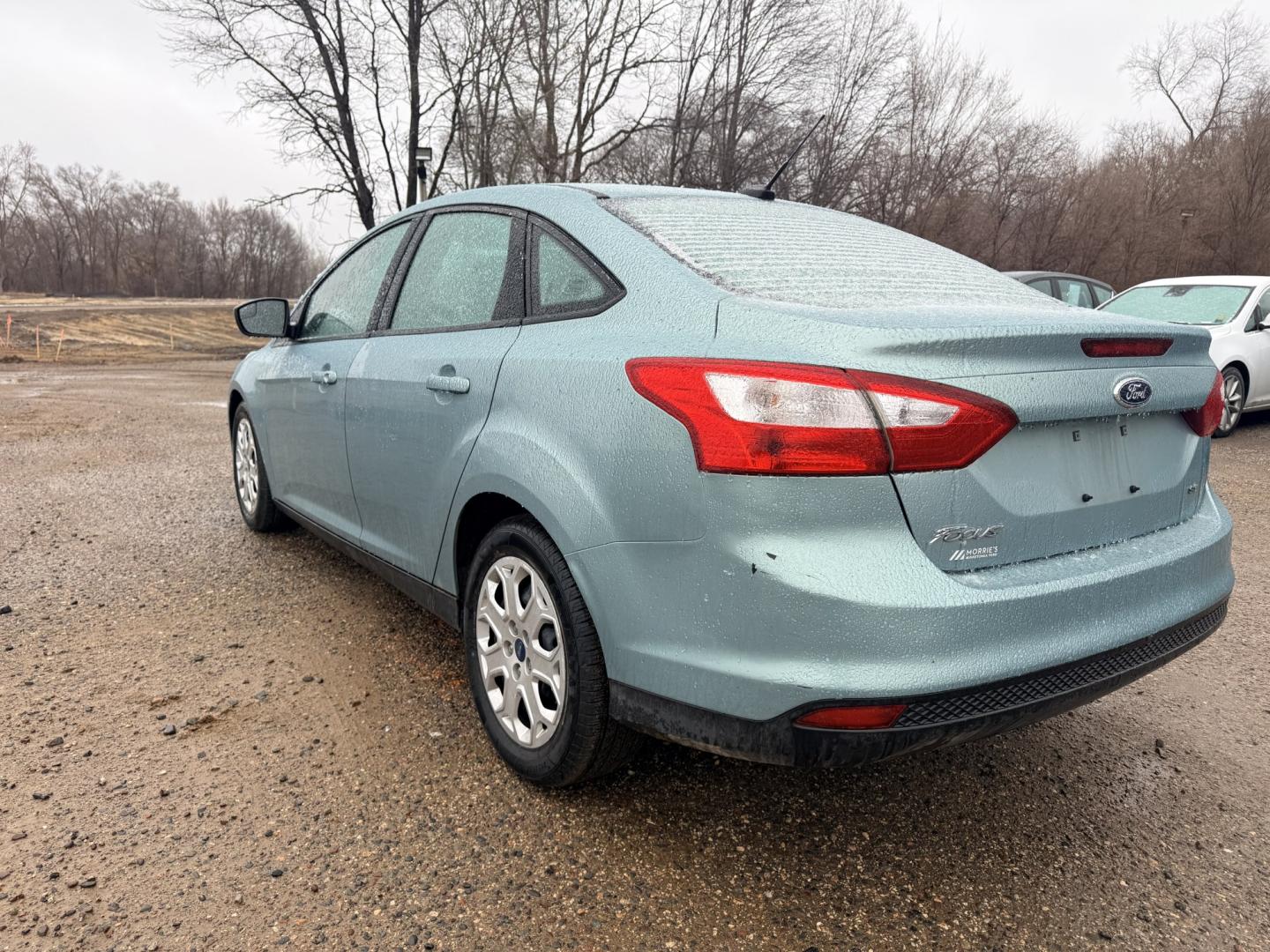 2012 Ford Focus SE Sedan (1FAHP3F2XCL) with an 2.0L L4 DOHC 16V engine, located at 17255 hwy 65 NE, Ham Lake, MN, 55304, 0.000000, 0.000000 - Photo#2