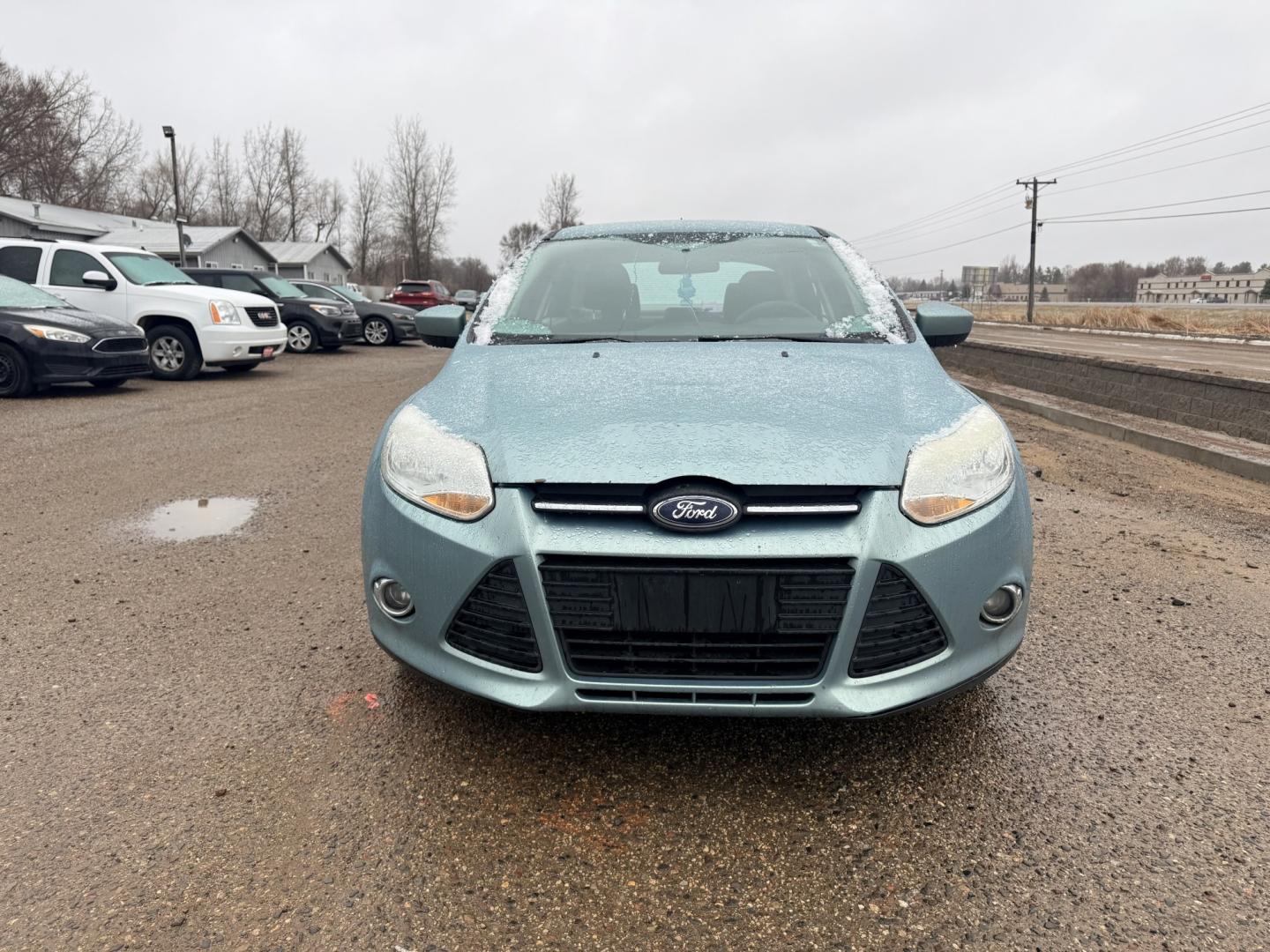 2012 Ford Focus SE Sedan (1FAHP3F2XCL) with an 2.0L L4 DOHC 16V engine, located at 17255 hwy 65 NE, Ham Lake, MN, 55304, 0.000000, 0.000000 - Photo#7