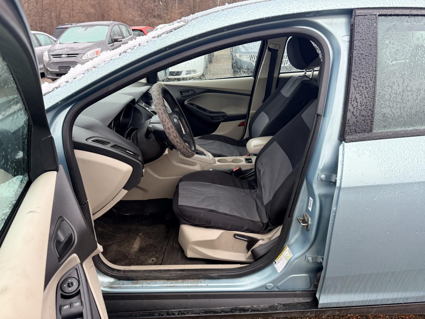 2012 Ford Focus SE Sedan (1FAHP3F2XCL) with an 2.0L L4 DOHC 16V engine, located at 17255 hwy 65 NE, Ham Lake, MN, 55304, 0.000000, 0.000000 - Photo#9