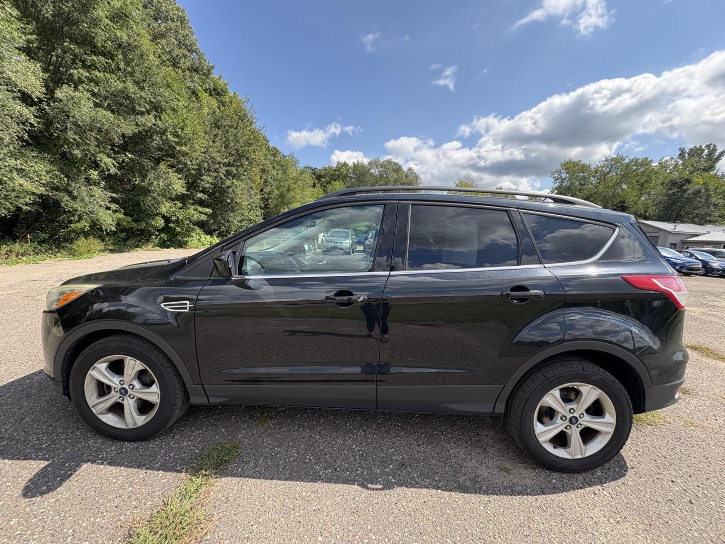2014 Ford Escape SE FWD (1FMCU0GXXEU) with an 1.6L L4 DOHC 16V engine, 6-Speed Automatic transmission, located at 17255 hwy 65 NE, Ham Lake, MN, 55304, 0.000000, 0.000000 - Photo#1