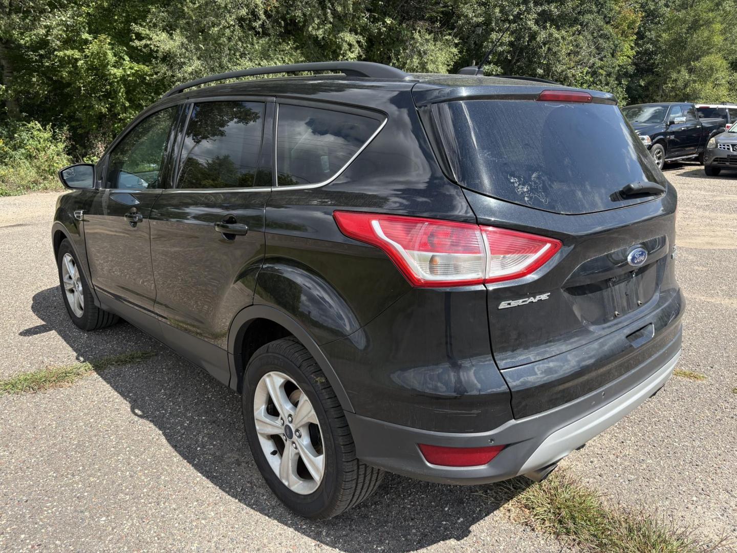 2014 Ford Escape SE FWD (1FMCU0GXXEU) with an 1.6L L4 DOHC 16V engine, 6-Speed Automatic transmission, located at 17255 hwy 65 NE, Ham Lake, MN, 55304, 0.000000, 0.000000 - Photo#2