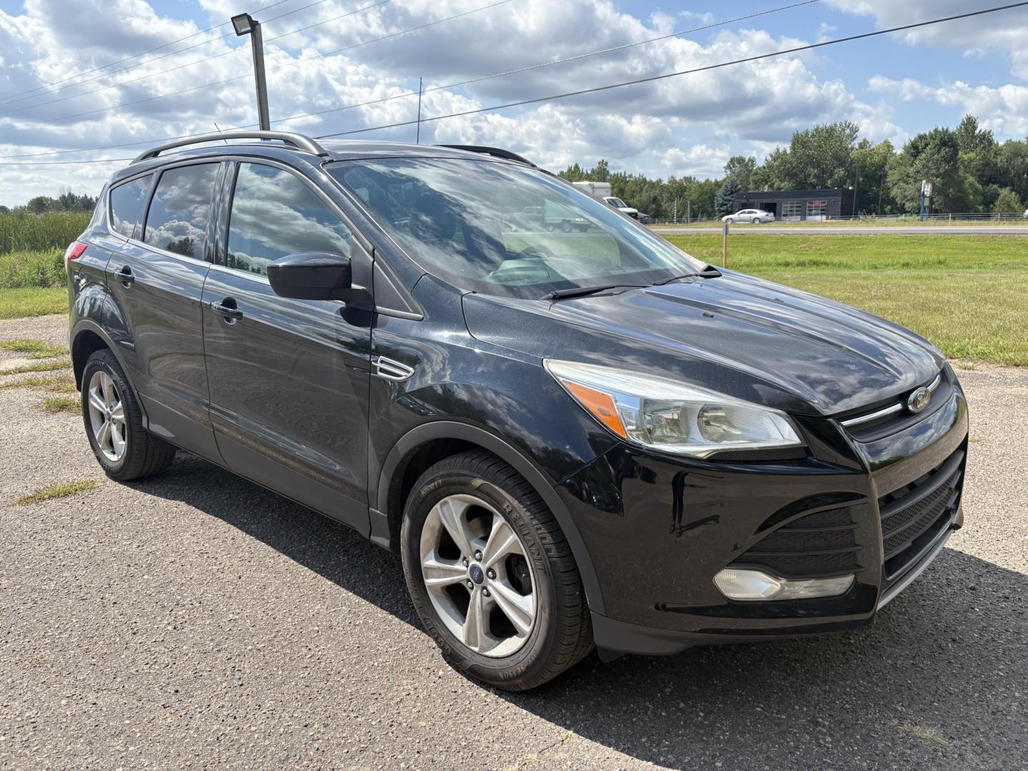 2014 Ford Escape SE FWD (1FMCU0GXXEU) with an 1.6L L4 DOHC 16V engine, 6-Speed Automatic transmission, located at 17255 hwy 65 NE, Ham Lake, MN, 55304, 0.000000, 0.000000 - Photo#6