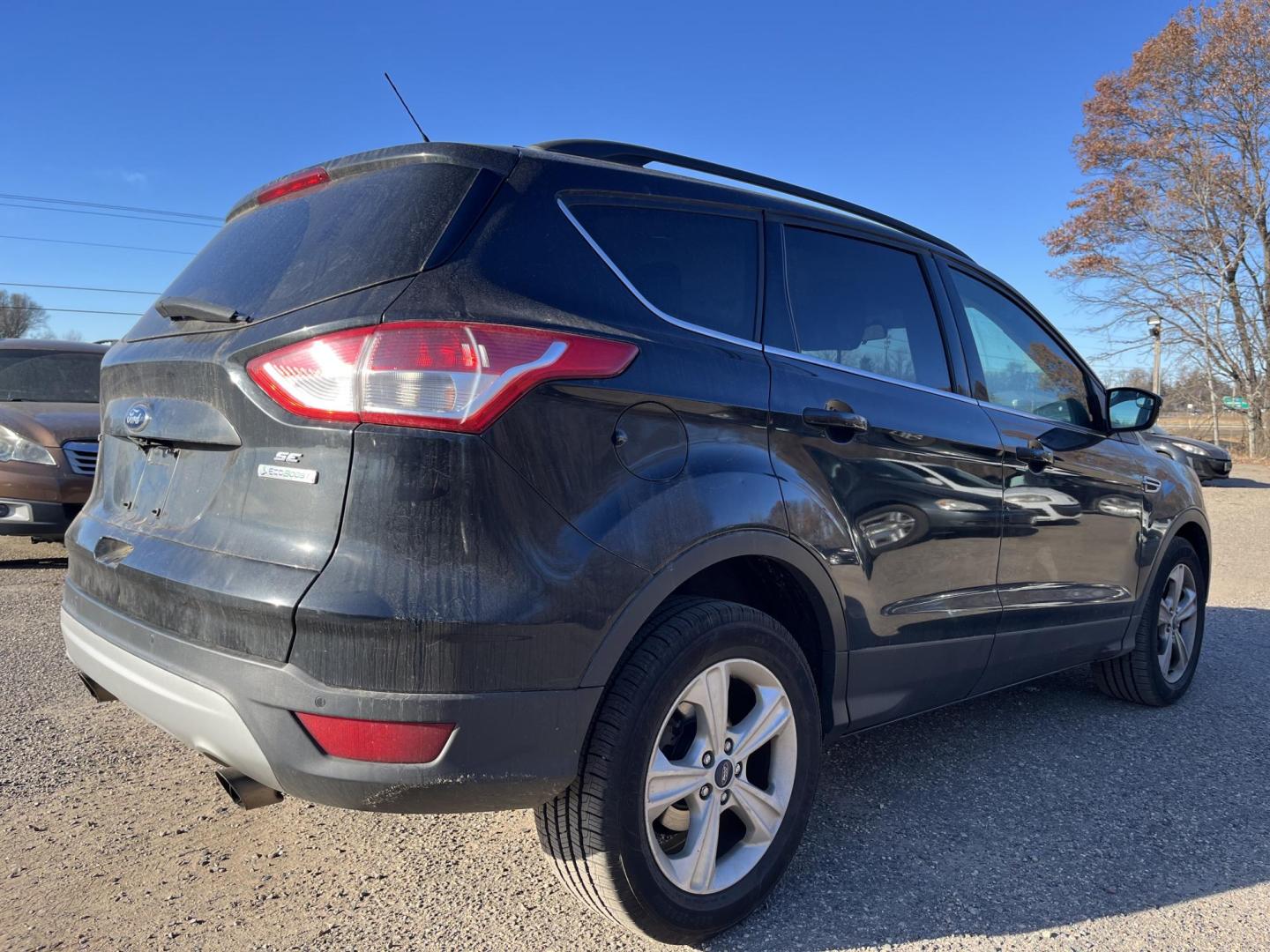 2014 Ford Escape SE FWD (1FMCU0GXXEU) with an 1.6L L4 DOHC 16V engine, 6-Speed Automatic transmission, located at 17255 hwy 65 NE, Ham Lake, MN, 55304, 0.000000, 0.000000 - Photo#4