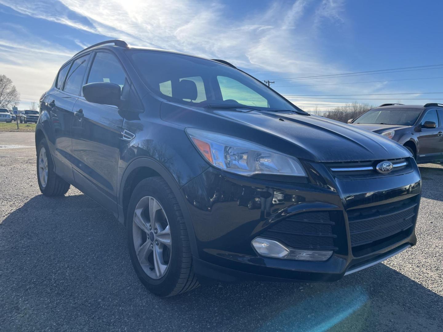 2014 Ford Escape SE FWD (1FMCU0GXXEU) with an 1.6L L4 DOHC 16V engine, 6-Speed Automatic transmission, located at 17255 hwy 65 NE, Ham Lake, MN, 55304, 0.000000, 0.000000 - Photo#6