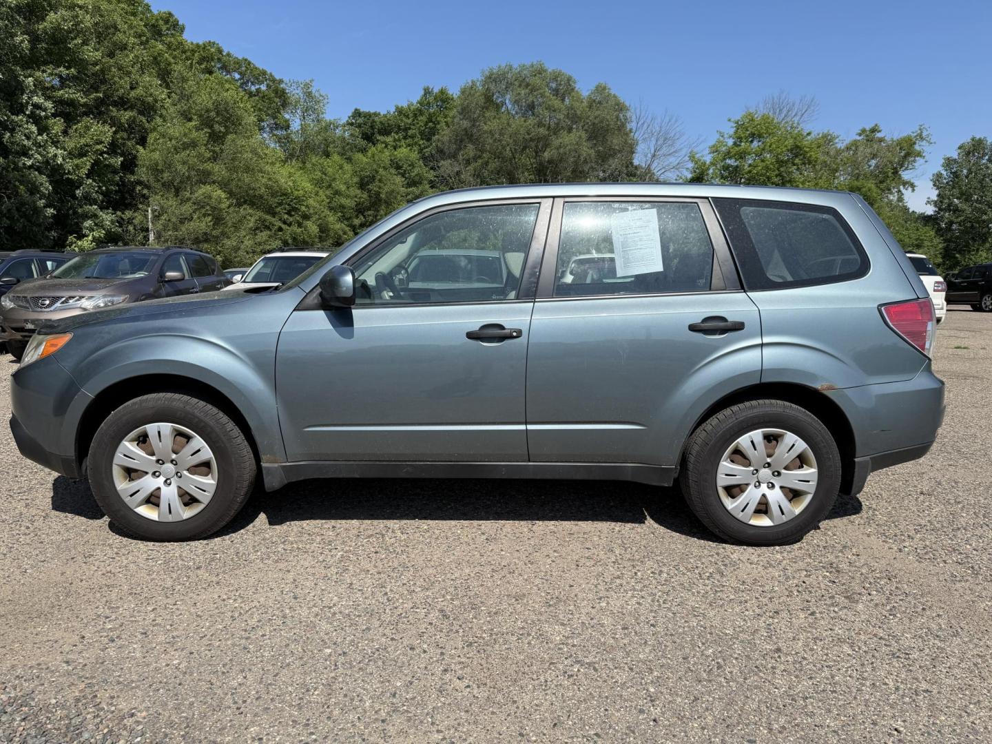 2009 Subaru Forester 2.5X (JF2SH61639H) with an 2.5L H4 SOHC 16V engine, 4-Speed Automatic Overdrive transmission, located at 17255 hwy 65 NE, Ham Lake, MN, 55304, 0.000000, 0.000000 - Photo#1