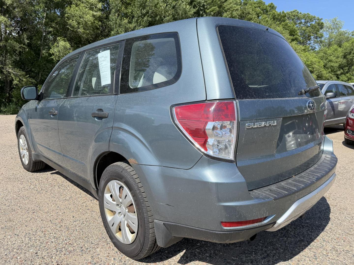2009 Subaru Forester 2.5X (JF2SH61639H) with an 2.5L H4 SOHC 16V engine, 4-Speed Automatic Overdrive transmission, located at 17255 hwy 65 NE, Ham Lake, MN, 55304, 0.000000, 0.000000 - Photo#2