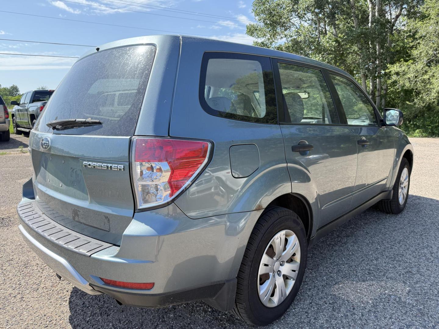 2009 Subaru Forester 2.5X (JF2SH61639H) with an 2.5L H4 SOHC 16V engine, 4-Speed Automatic Overdrive transmission, located at 17255 hwy 65 NE, Ham Lake, MN, 55304, 0.000000, 0.000000 - Photo#4