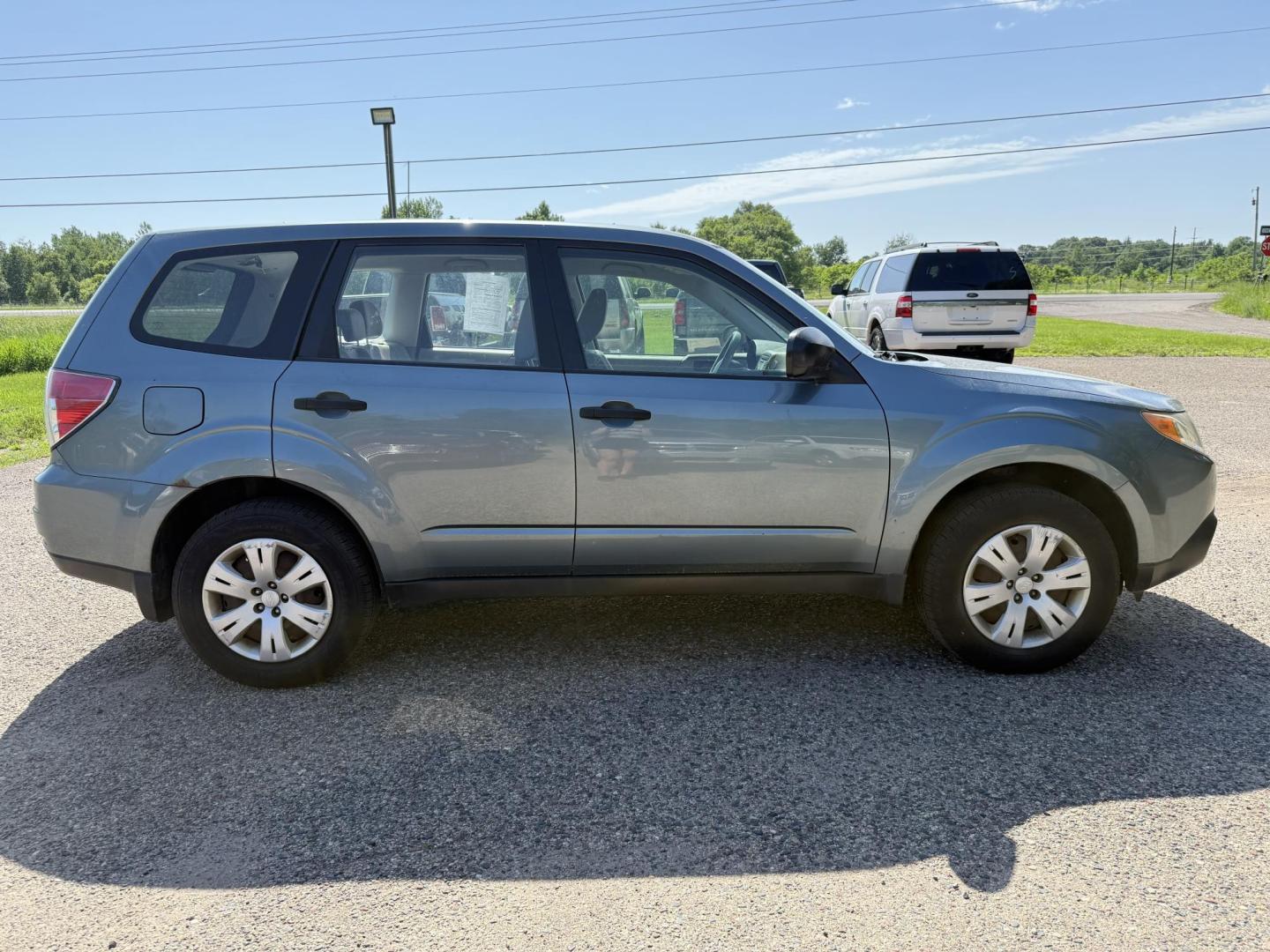 2009 Subaru Forester 2.5X (JF2SH61639H) with an 2.5L H4 SOHC 16V engine, 4-Speed Automatic Overdrive transmission, located at 17255 hwy 65 NE, Ham Lake, MN, 55304, 0.000000, 0.000000 - Photo#5