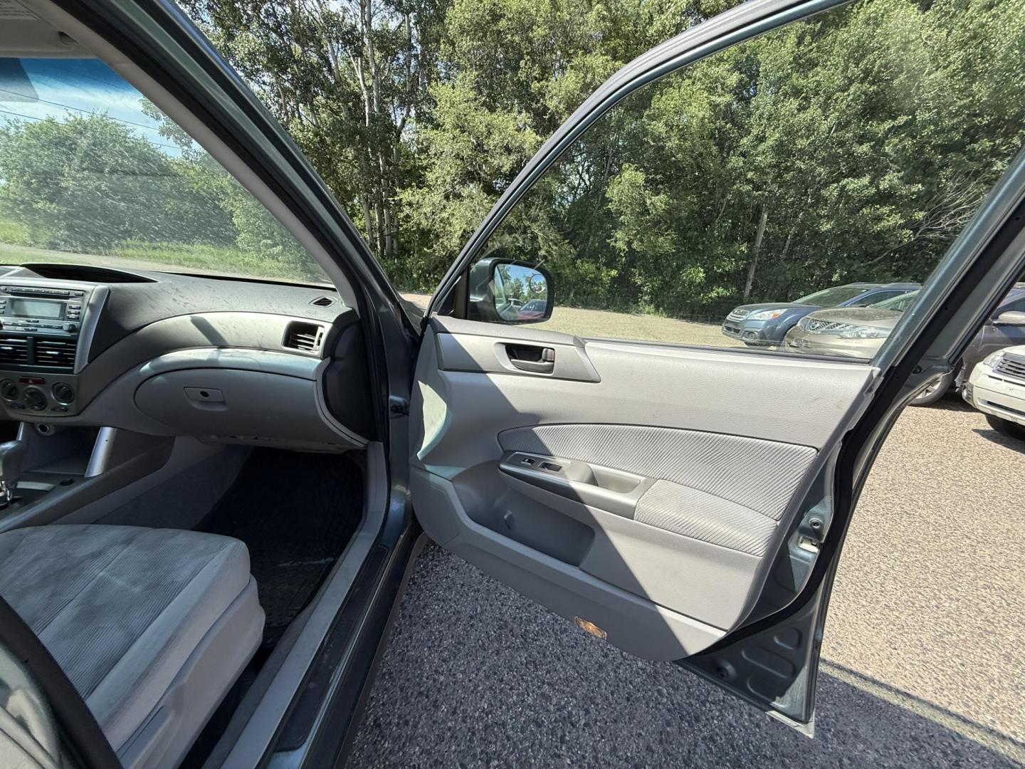 2009 Subaru Forester 2.5X (JF2SH61639H) with an 2.5L H4 SOHC 16V engine, 4-Speed Automatic Overdrive transmission, located at 17255 hwy 65 NE, Ham Lake, MN, 55304, 0.000000, 0.000000 - Photo#14