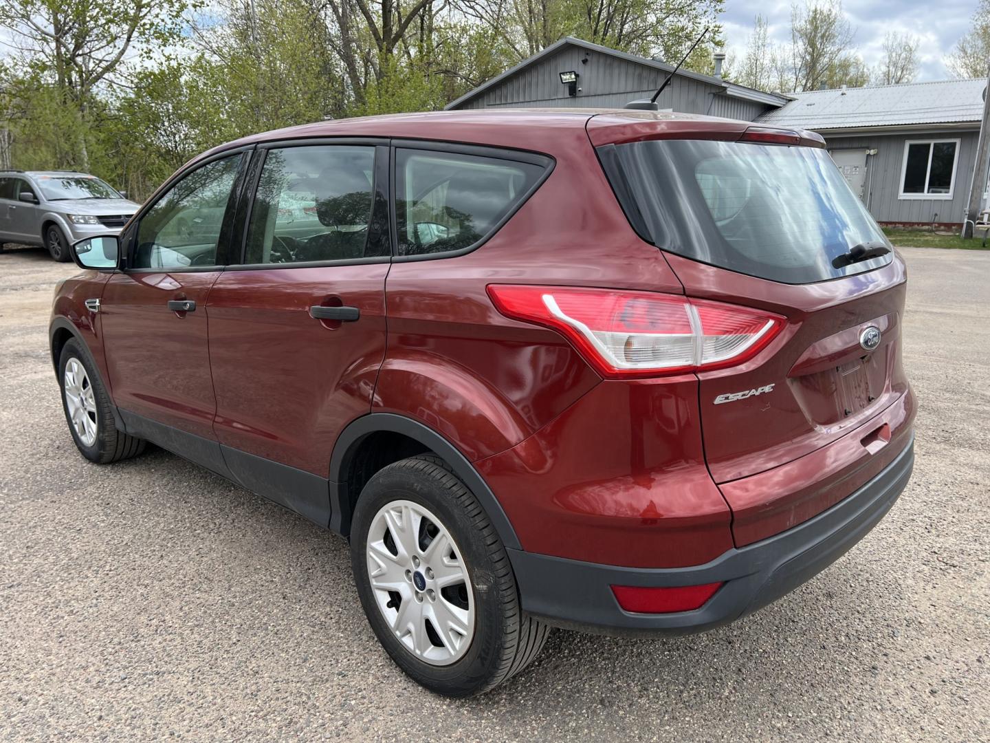 2014 Orange /Black Ford Escape S FWD (1FMCU0F79EU) with an 2.5L L4 DOHC 16V engine, 6-Speed Automatic transmission, located at 17255 hwy 65 NE, Ham Lake, MN, 55304, 0.000000, 0.000000 - Photo#6