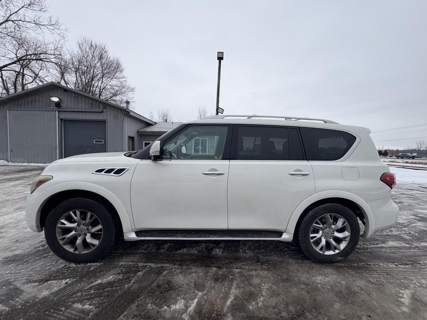 2012 Infiniti QX56 4WD (JN8AZ2NEXC9) with an 5.6L V8 DOHC 32V engine, 5-Speed Automatic transmission, located at 17255 hwy 65 NE, Ham Lake, MN, 55304, 0.000000, 0.000000 - Photo#1
