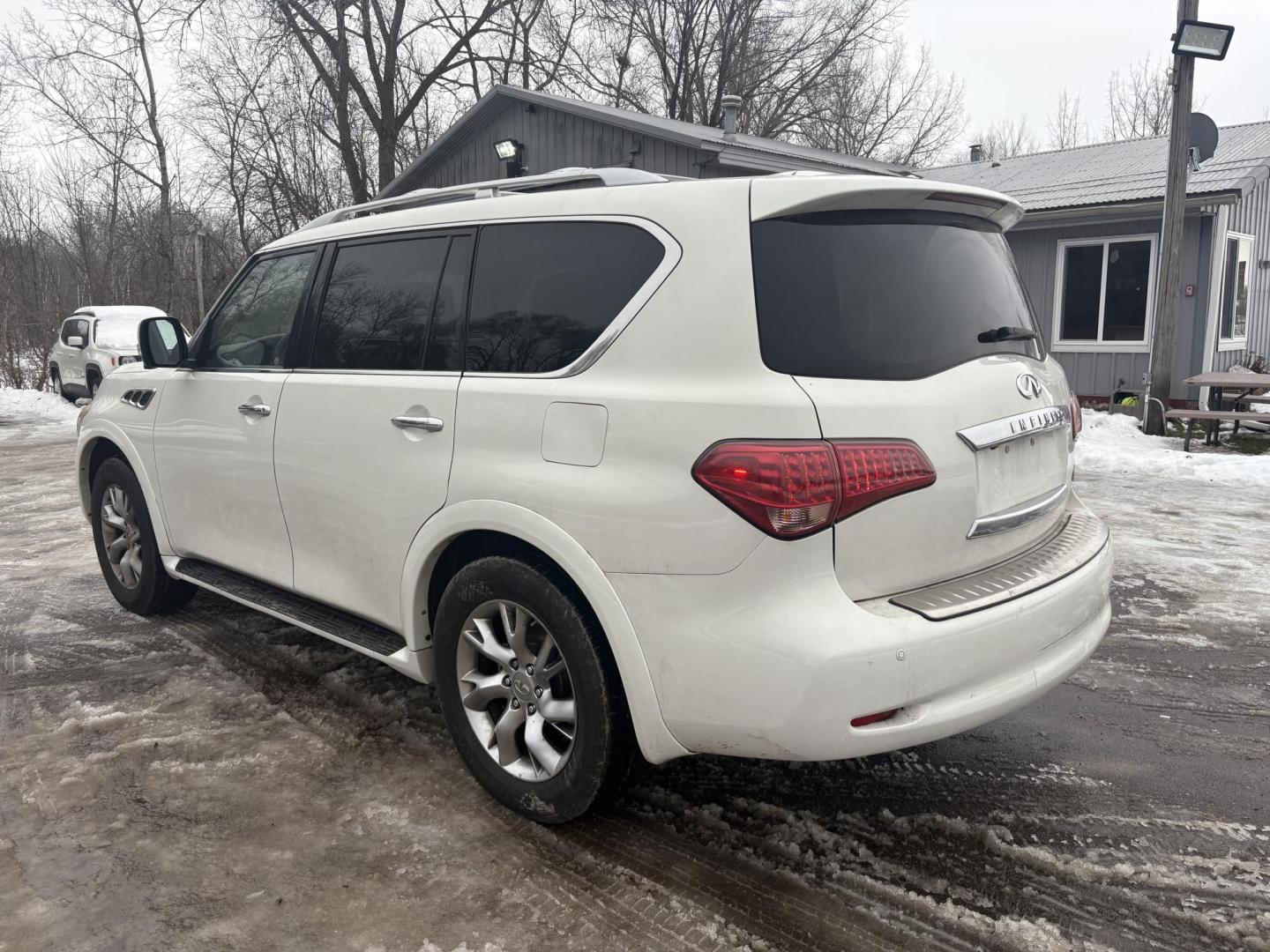 2012 Infiniti QX56 4WD (JN8AZ2NEXC9) with an 5.6L V8 DOHC 32V engine, 5-Speed Automatic transmission, located at 17255 hwy 65 NE, Ham Lake, MN, 55304, 0.000000, 0.000000 - Photo#2
