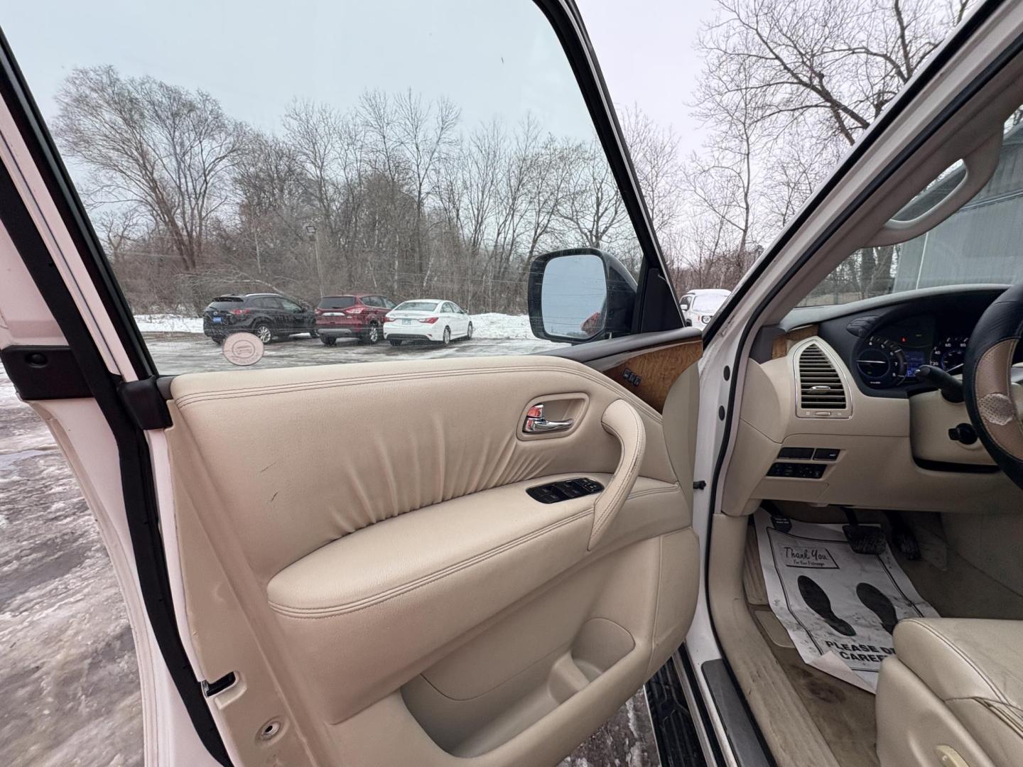 2012 Infiniti QX56 4WD (JN8AZ2NEXC9) with an 5.6L V8 DOHC 32V engine, 5-Speed Automatic transmission, located at 17255 hwy 65 NE, Ham Lake, MN, 55304, 0.000000, 0.000000 - Photo#8