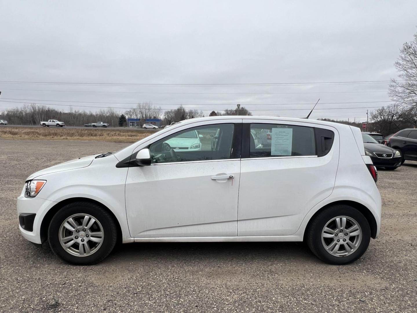 2012 Chevrolet Sonic 1LT 5-Door (1G1JD6SH4C4) with an 1.8L L4 DOHC 24V FFV engine, MANUAL transmission, located at 17255 hwy 65 NE, Ham Lake, MN, 55304, 0.000000, 0.000000 - Photo#1