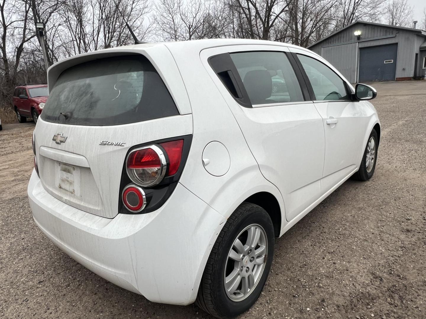 2012 Chevrolet Sonic 1LT 5-Door (1G1JD6SH4C4) with an 1.8L L4 DOHC 24V FFV engine, MANUAL transmission, located at 17255 hwy 65 NE, Ham Lake, MN, 55304, 0.000000, 0.000000 - Photo#4
