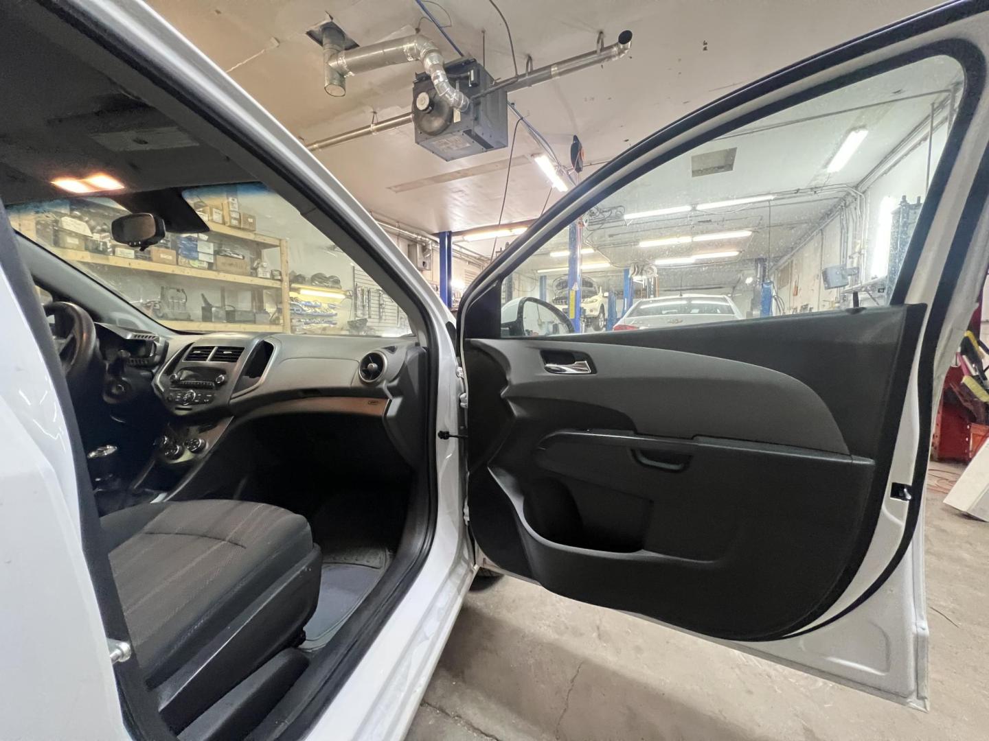 2012 Chevrolet Sonic 1LT 5-Door (1G1JD6SH4C4) with an 1.8L L4 DOHC 24V FFV engine, MANUAL transmission, located at 17255 hwy 65 NE, Ham Lake, MN, 55304, 0.000000, 0.000000 - Photo#13