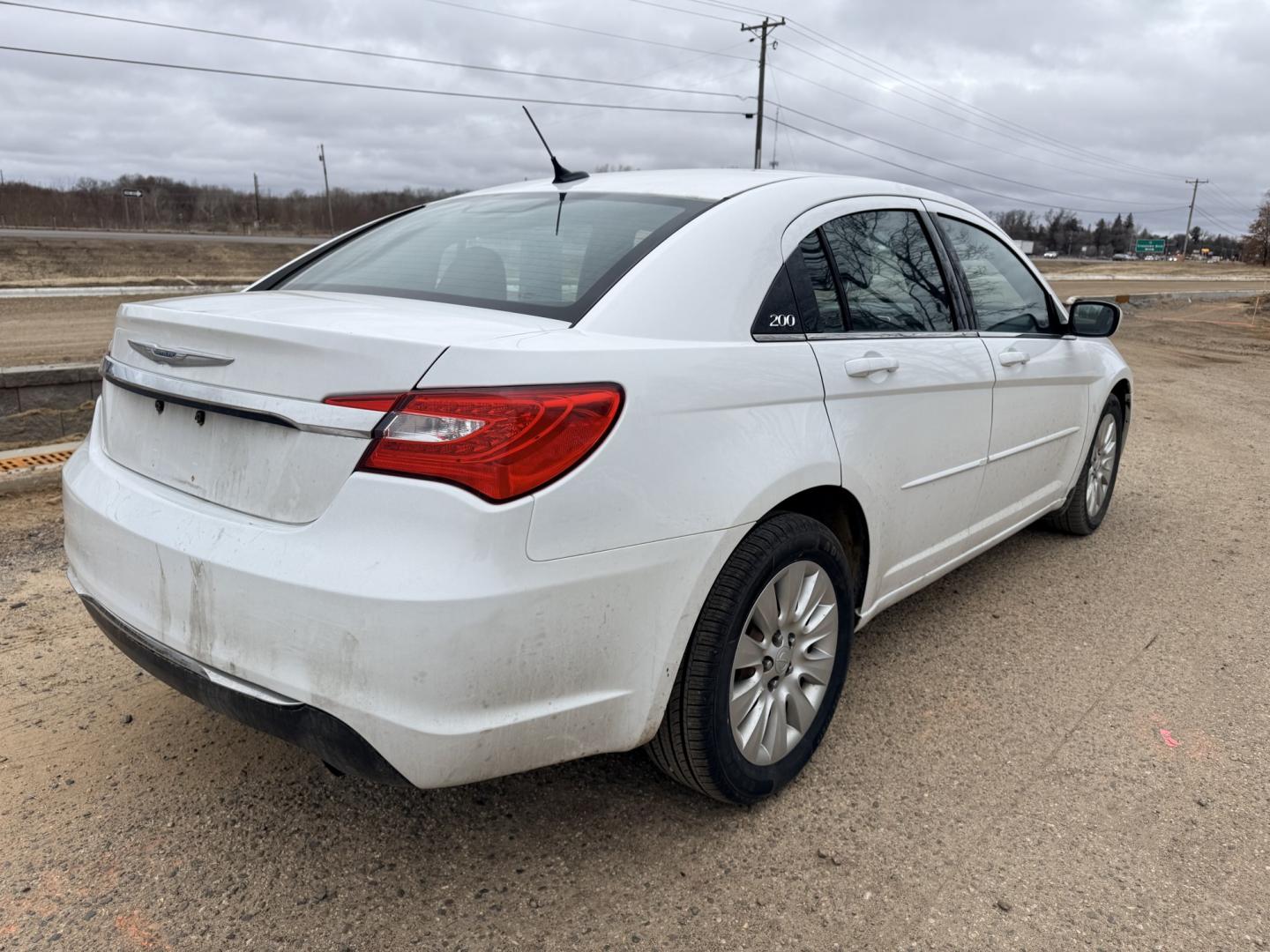 2012 Chrysler 200 LX (1C3CCBAB9CN) with an 2.4L L4 DOHC 16V engine, 6-Speed Automatic transmission, located at 17255 hwy 65 NE, Ham Lake, MN, 55304, 0.000000, 0.000000 - Photo#4