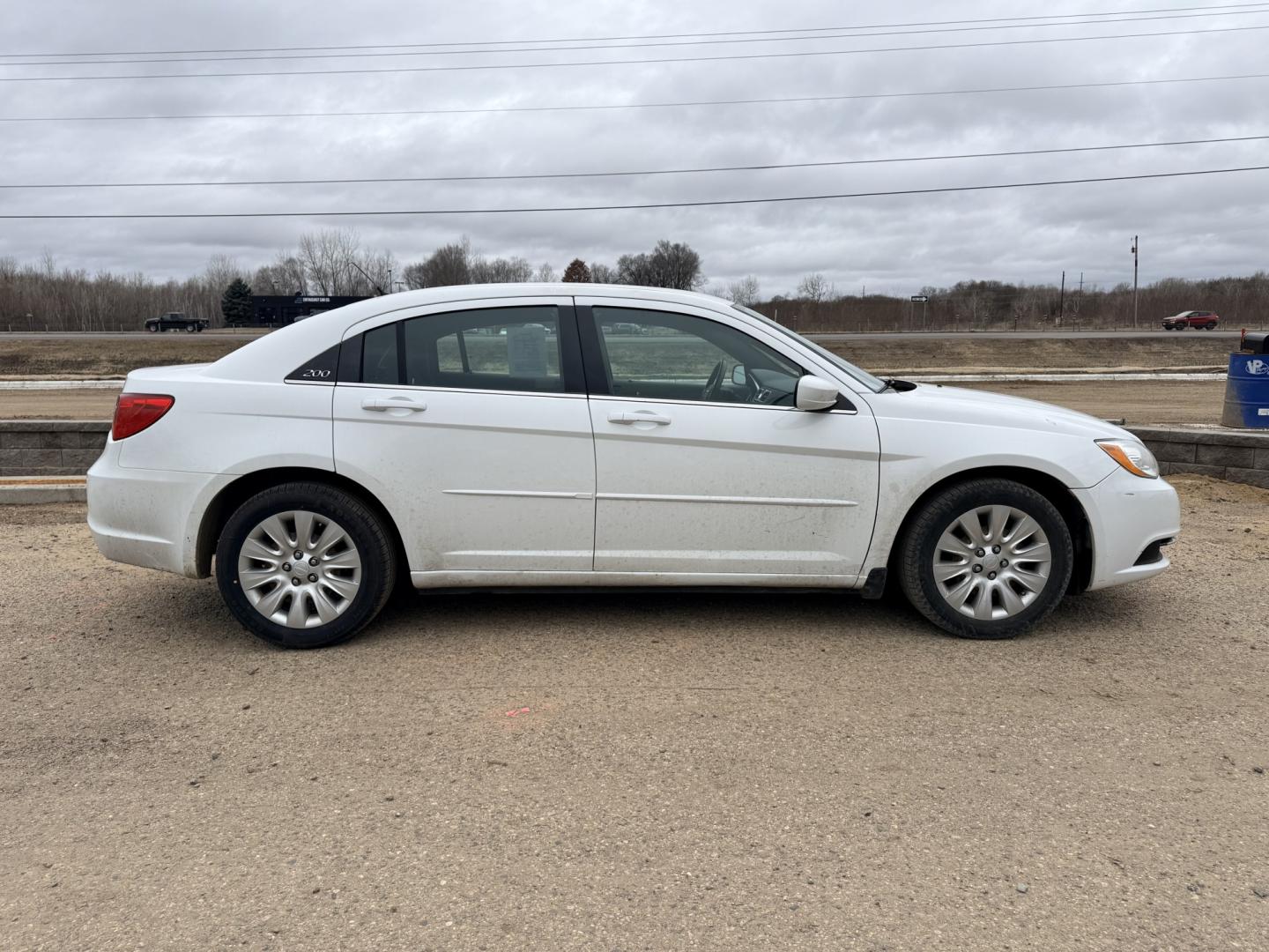 2012 Chrysler 200 LX (1C3CCBAB9CN) with an 2.4L L4 DOHC 16V engine, 6-Speed Automatic transmission, located at 17255 hwy 65 NE, Ham Lake, MN, 55304, 0.000000, 0.000000 - Photo#5