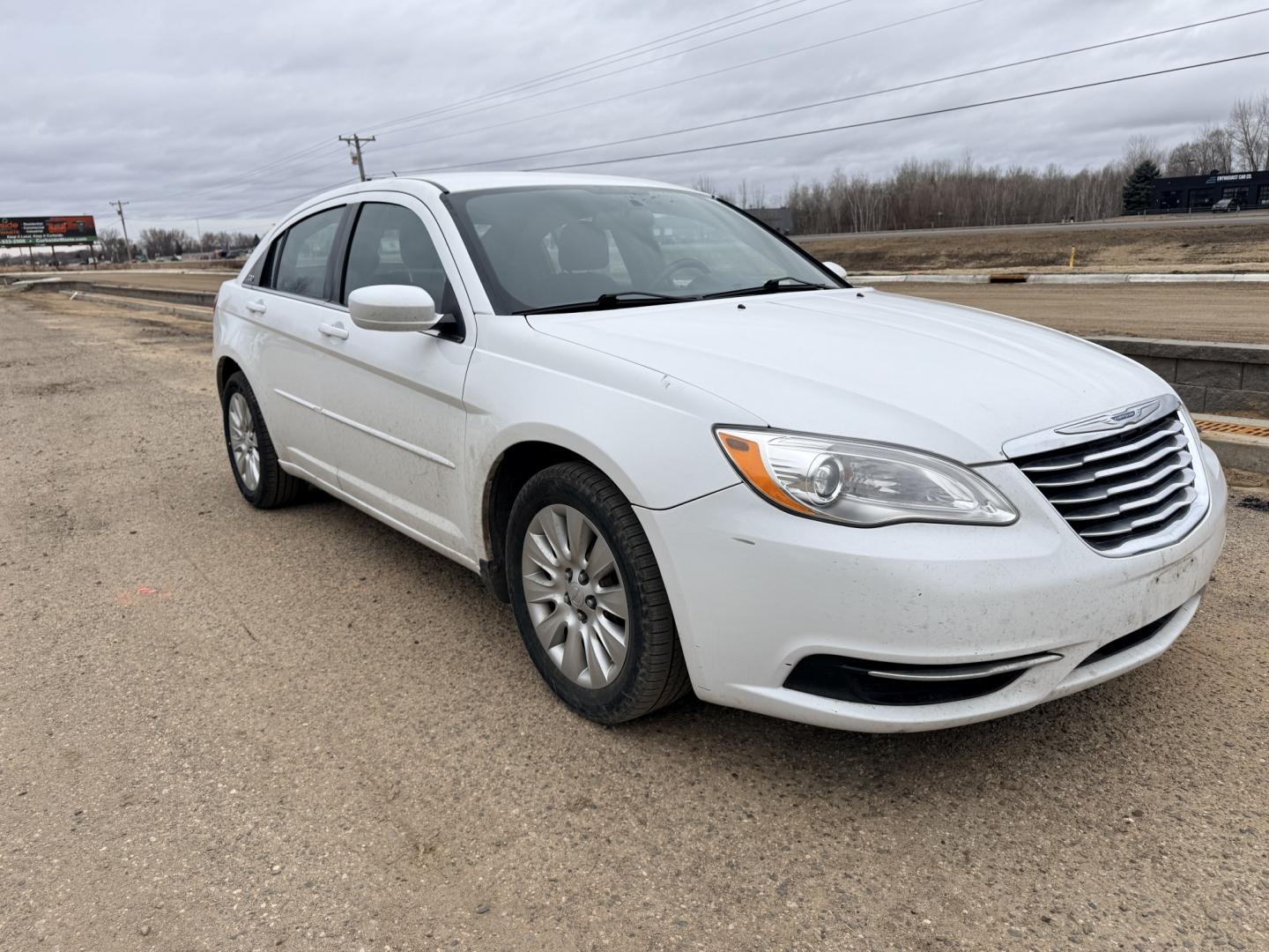 2012 Chrysler 200 LX (1C3CCBAB9CN) with an 2.4L L4 DOHC 16V engine, 6-Speed Automatic transmission, located at 17255 hwy 65 NE, Ham Lake, MN, 55304, 0.000000, 0.000000 - Photo#6