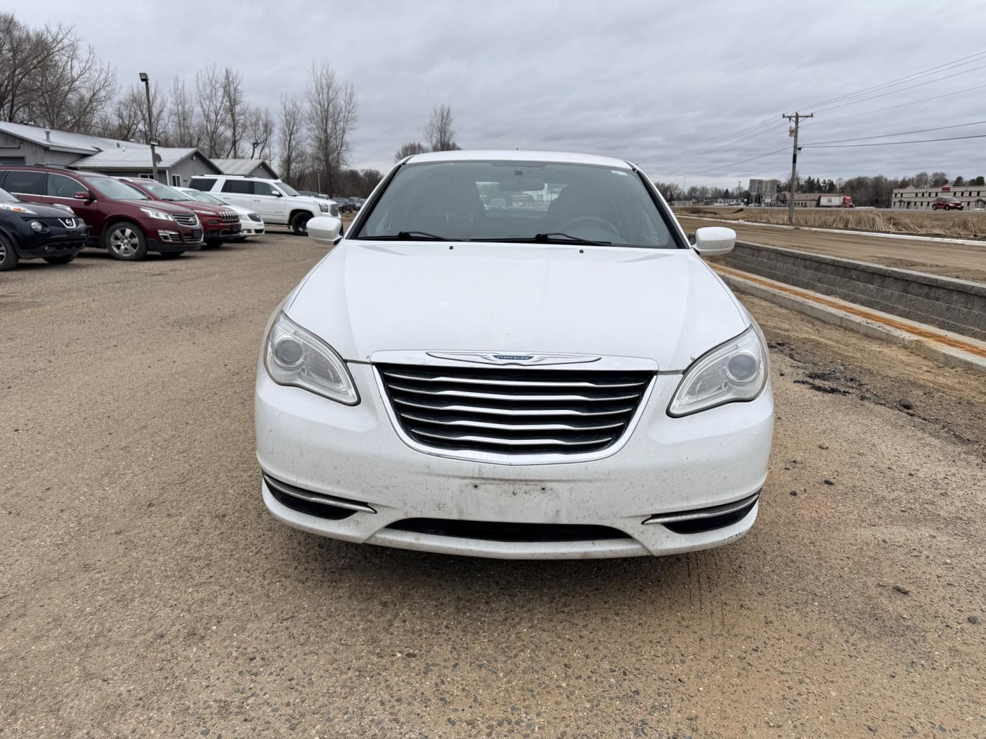 2012 Chrysler 200 LX (1C3CCBAB9CN) with an 2.4L L4 DOHC 16V engine, 6-Speed Automatic transmission, located at 17255 hwy 65 NE, Ham Lake, MN, 55304, 0.000000, 0.000000 - Photo#7