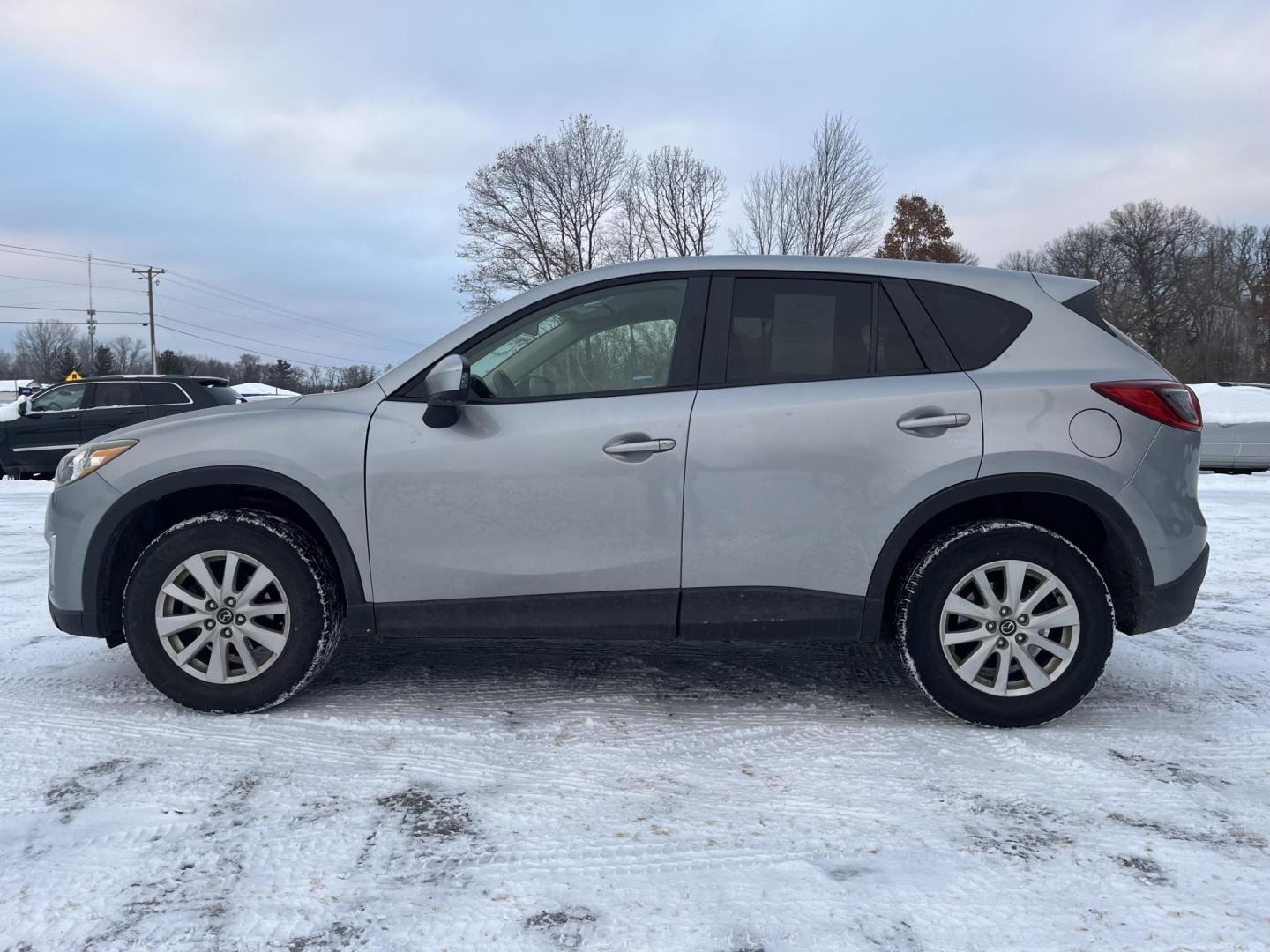 2014 Mazda CX-5 Touring AWD (JM3KE4CY2E0) with an 2.5L L4 DOHC 16V engine, 6-Speed Automatic transmission, located at 17255 hwy 65 NE, Ham Lake, MN, 55304, 0.000000, 0.000000 - Photo#1