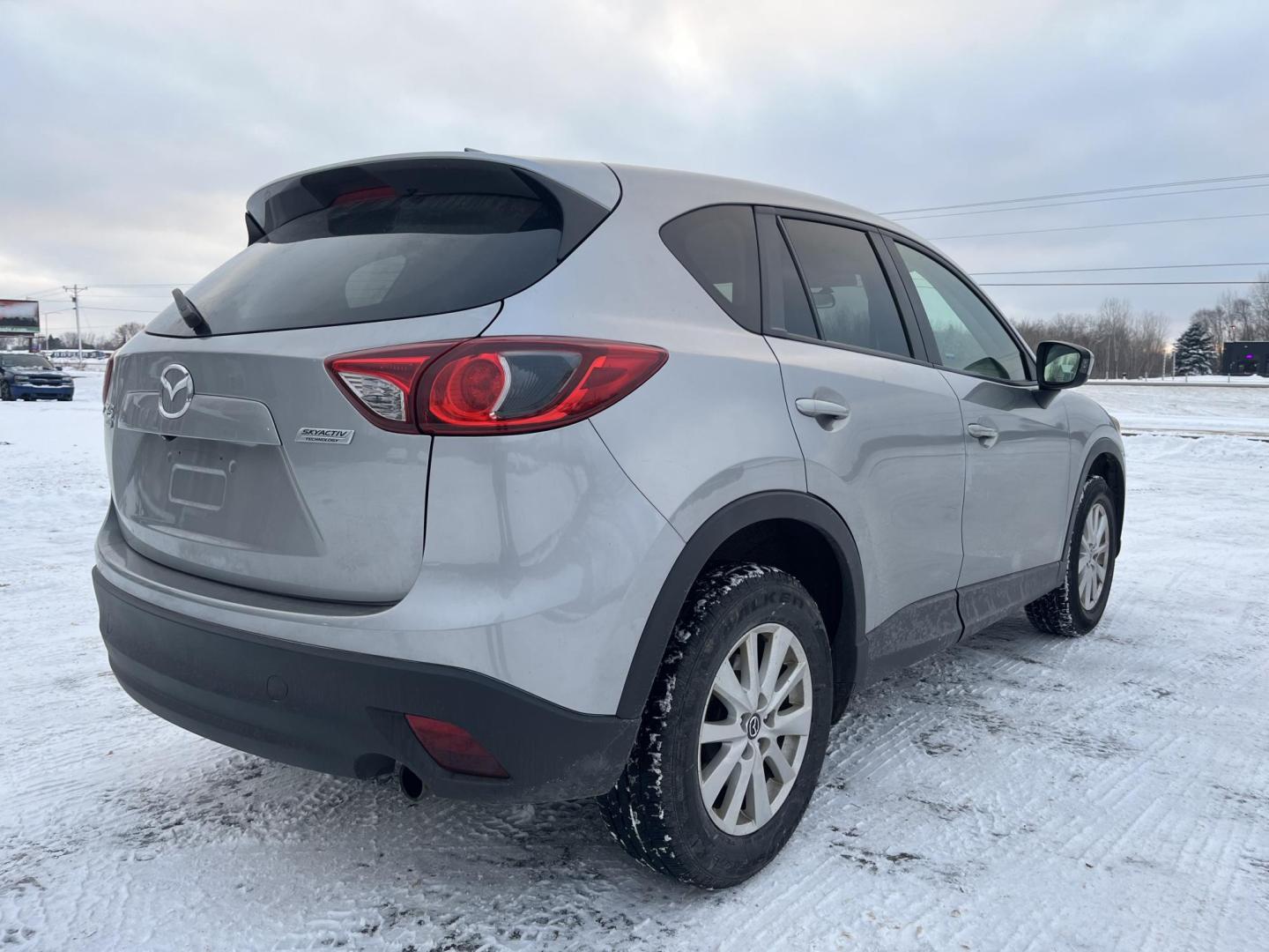 2014 Mazda CX-5 Touring AWD (JM3KE4CY2E0) with an 2.5L L4 DOHC 16V engine, 6-Speed Automatic transmission, located at 17255 hwy 65 NE, Ham Lake, MN, 55304, 0.000000, 0.000000 - Photo#4