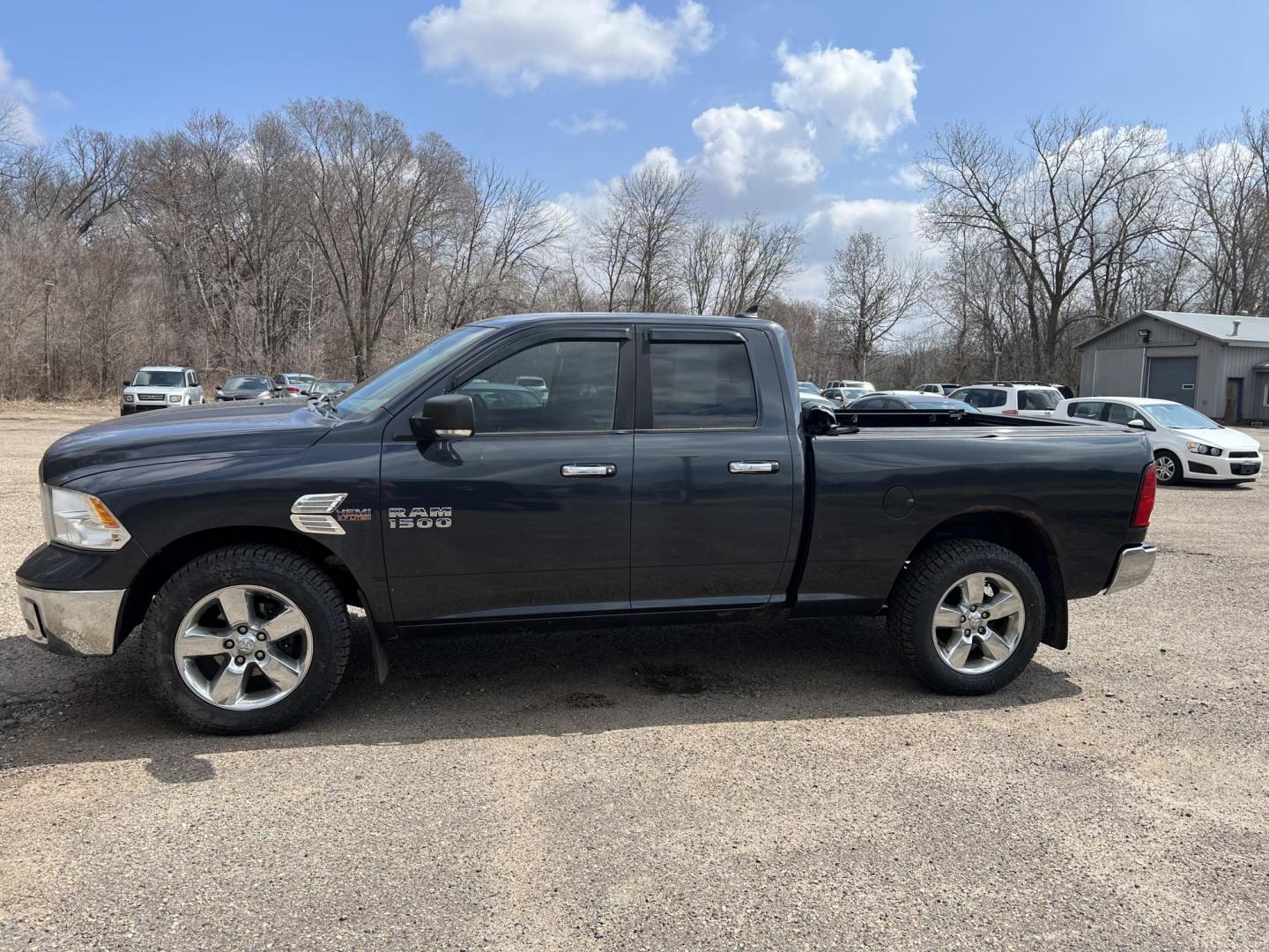 2014 RAM 1500 SLT Quad Cab 4WD (1C6RR7GT9ES) with an 5.7L V8 OHV 16V engine, 6-Speed Automatic transmission, located at 17255 hwy 65 NE, Ham Lake, MN, 55304, 0.000000, 0.000000 - Photo#1