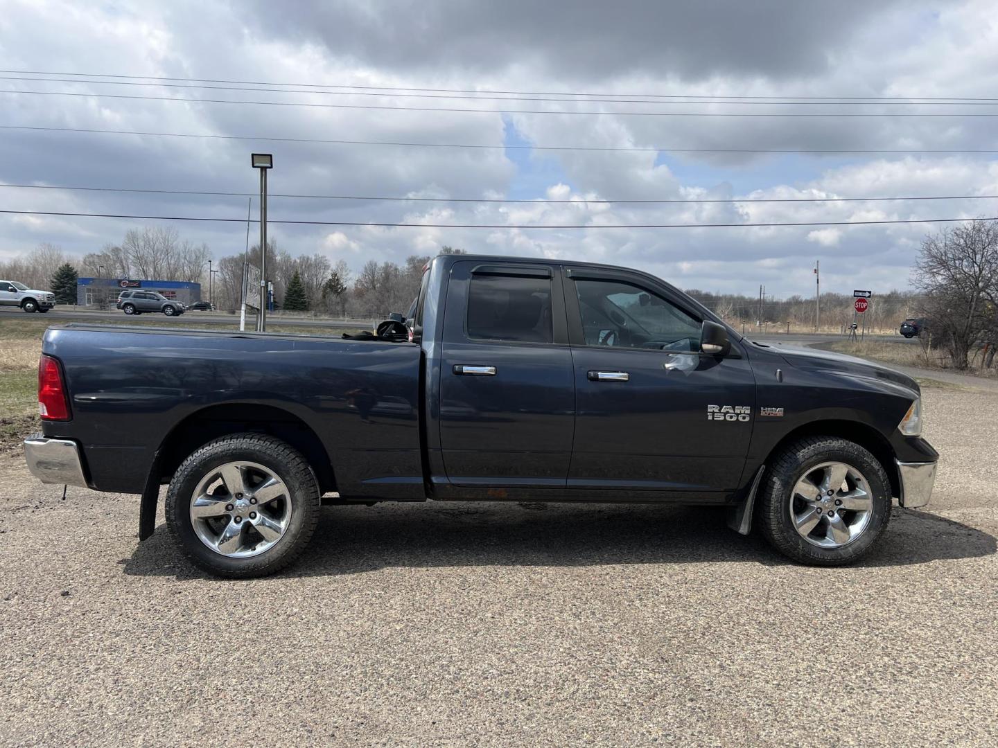 2014 RAM 1500 SLT Quad Cab 4WD (1C6RR7GT9ES) with an 5.7L V8 OHV 16V engine, 6-Speed Automatic transmission, located at 17255 hwy 65 NE, Ham Lake, MN, 55304, 0.000000, 0.000000 - Photo#5