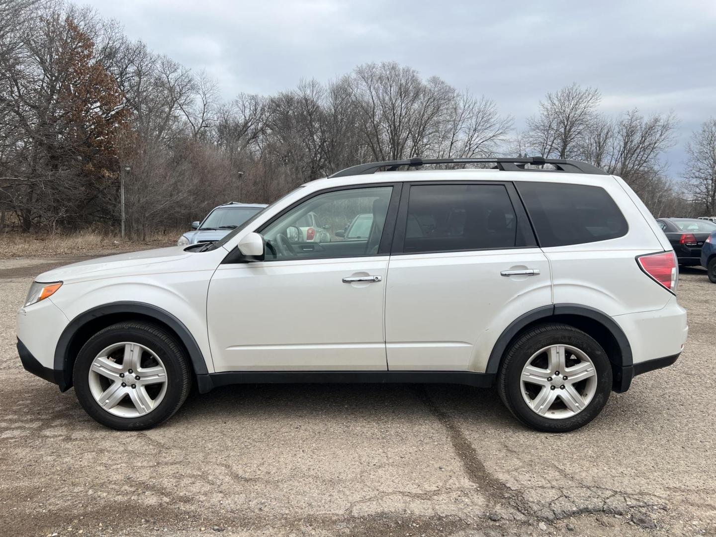 2009 Subaru Forester 2.5X Limited (JF2SH64639H) with an 2.5L H4 SOHC 16V engine, 4-Speed Automatic transmission, located at 17255 hwy 65 NE, Ham Lake, MN, 55304, 0.000000, 0.000000 - Photo#1