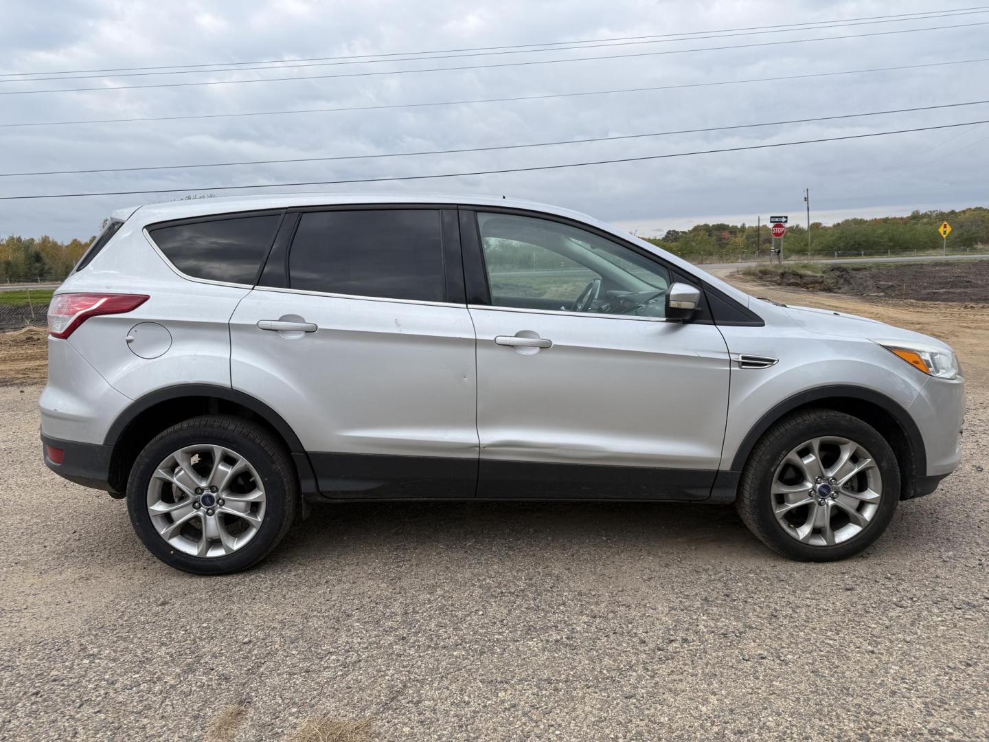 2013 Ford Escape SEL 4WD (1FMCU9H90DU) with an 2.0L L4 DOHC 16V engine, 6-Speed Automatic transmission, located at 17255 hwy 65 NE, Ham Lake, MN, 55304, 0.000000, 0.000000 - Photo#5