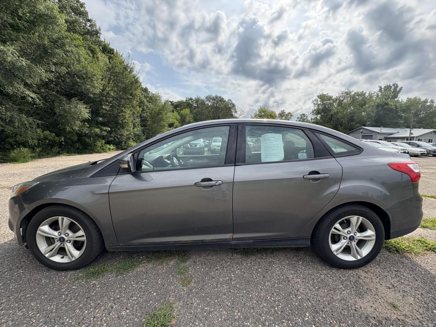 2014 Ford Focus SE Sedan (1FADP3F26EL) with an 2.0L L4 DOHC 16V engine, located at 17255 hwy 65 NE, Ham Lake, MN, 55304, 0.000000, 0.000000 - Photo#1