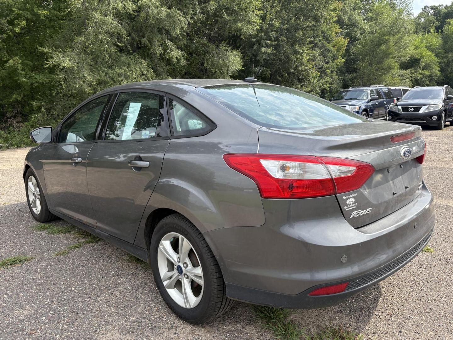 2014 Ford Focus SE Sedan (1FADP3F26EL) with an 2.0L L4 DOHC 16V engine, located at 17255 hwy 65 NE, Ham Lake, MN, 55304, 0.000000, 0.000000 - Photo#2