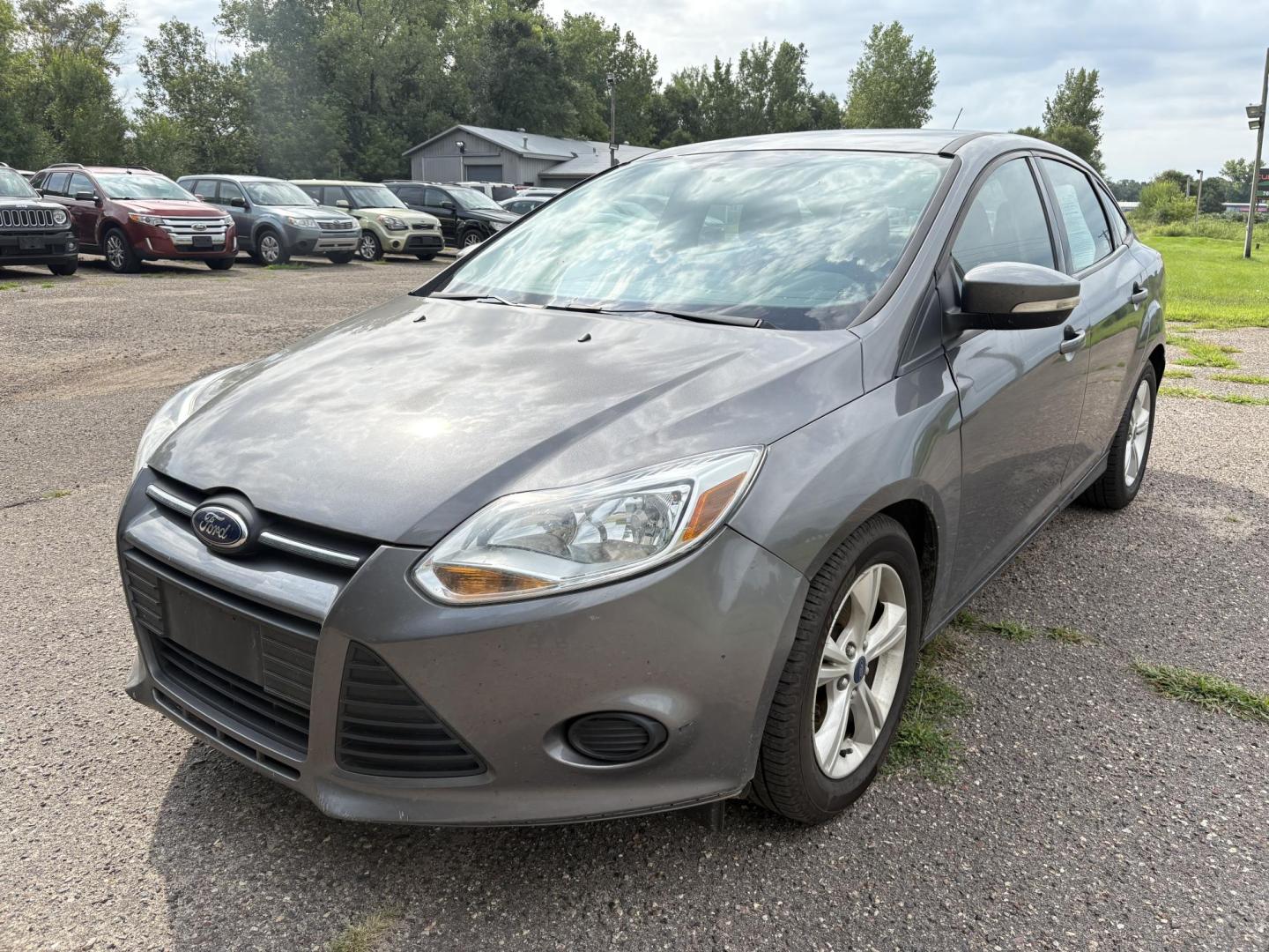 2014 Ford Focus SE Sedan (1FADP3F26EL) with an 2.0L L4 DOHC 16V engine, located at 17255 hwy 65 NE, Ham Lake, MN, 55304, 0.000000, 0.000000 - Photo#0