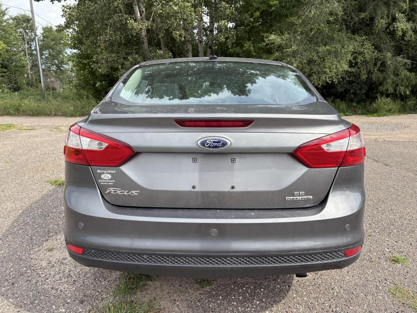 2014 Ford Focus SE Sedan (1FADP3F26EL) with an 2.0L L4 DOHC 16V engine, located at 17255 hwy 65 NE, Ham Lake, MN, 55304, 0.000000, 0.000000 - Photo#3