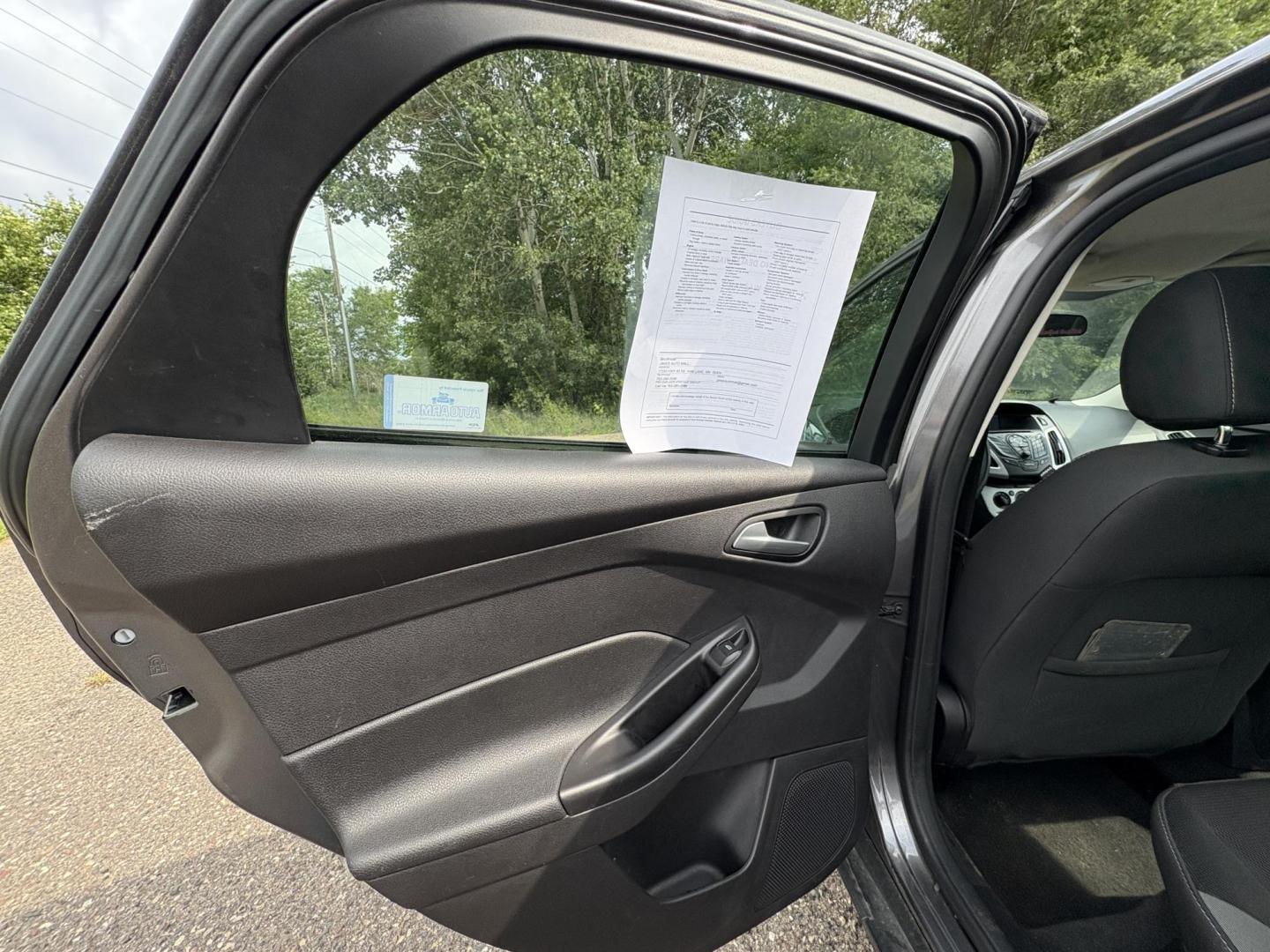 2014 Ford Focus SE Sedan (1FADP3F26EL) with an 2.0L L4 DOHC 16V engine, located at 17255 hwy 65 NE, Ham Lake, MN, 55304, 0.000000, 0.000000 - Photo#10