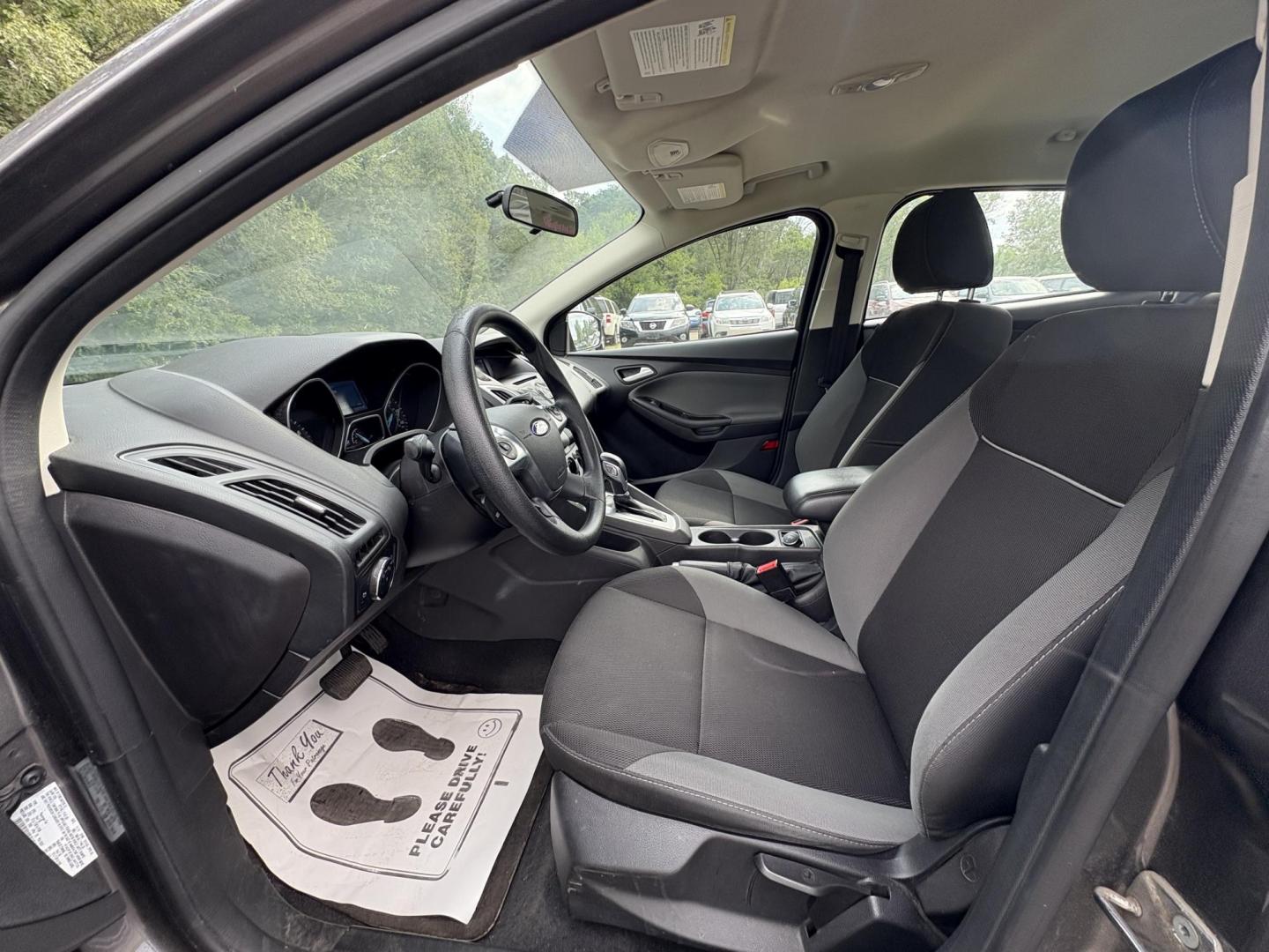 2014 Ford Focus SE Sedan (1FADP3F26EL) with an 2.0L L4 DOHC 16V engine, located at 17255 hwy 65 NE, Ham Lake, MN, 55304, 0.000000, 0.000000 - Photo#9
